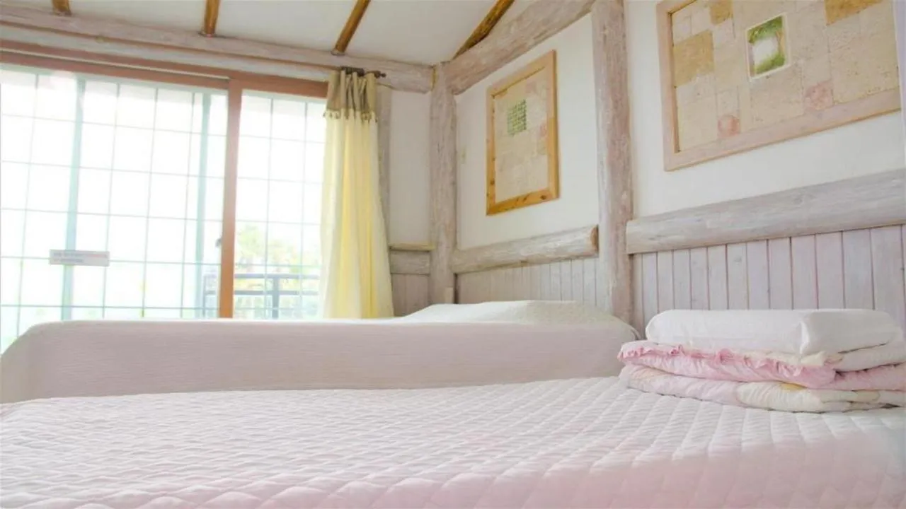 Bed in Seogwipo Beautiful Resort