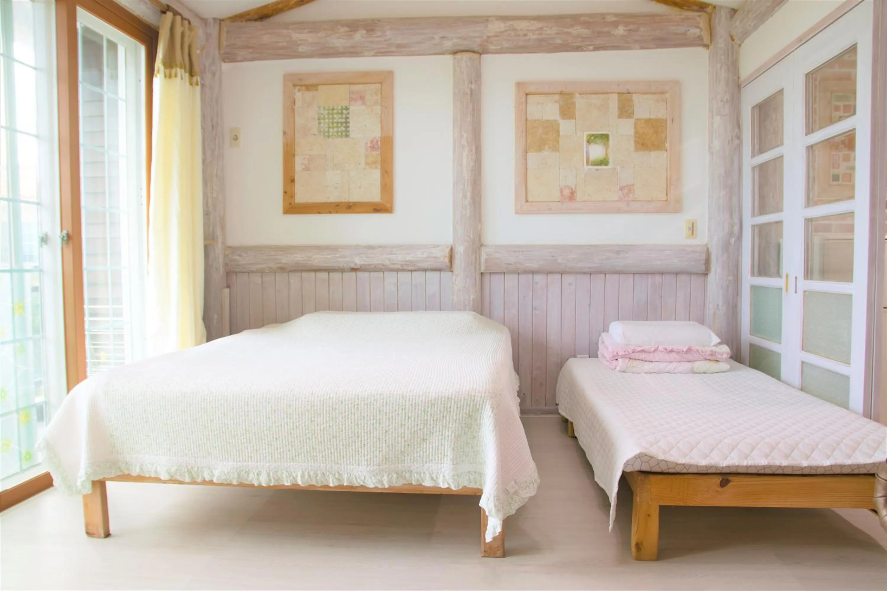 Bed in Seogwipo Beautiful Resort