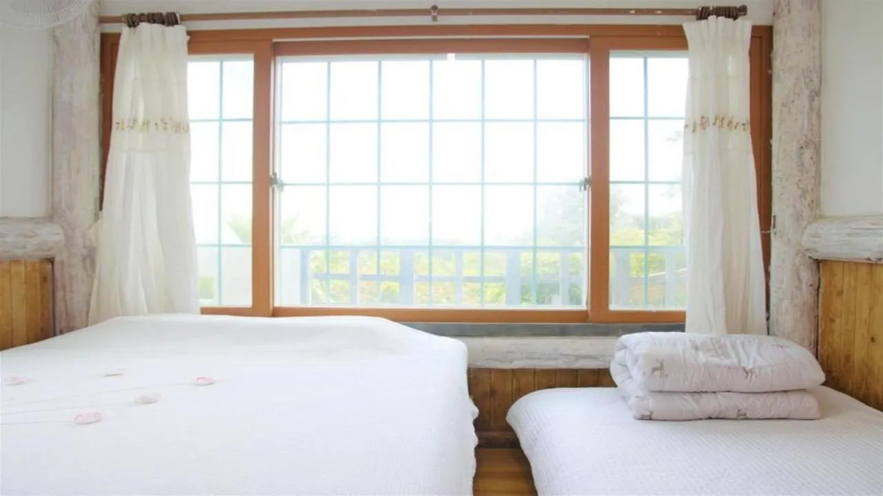 Bed in Seogwipo Beautiful Resort
