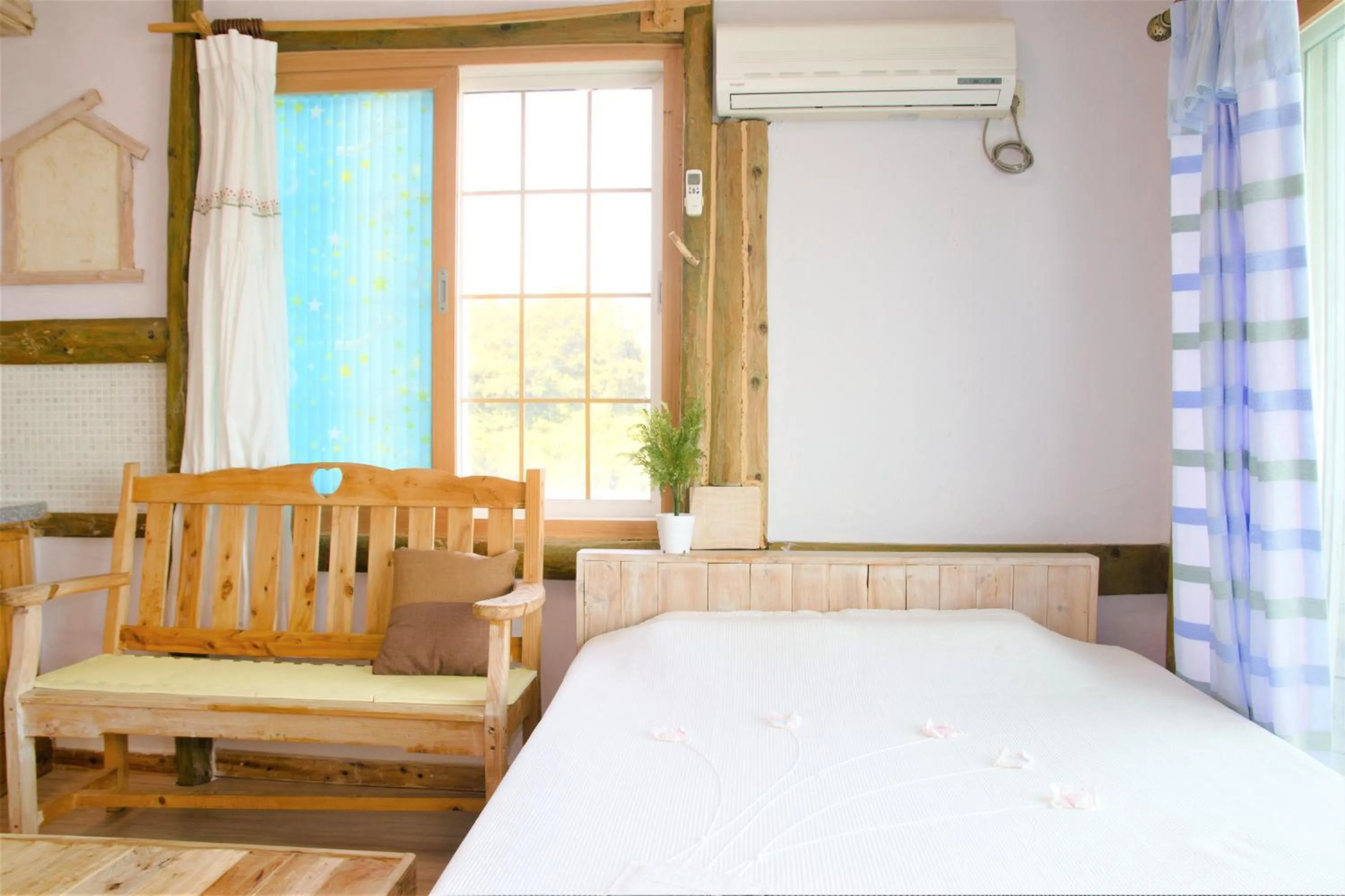 Bed in Seogwipo Beautiful Resort