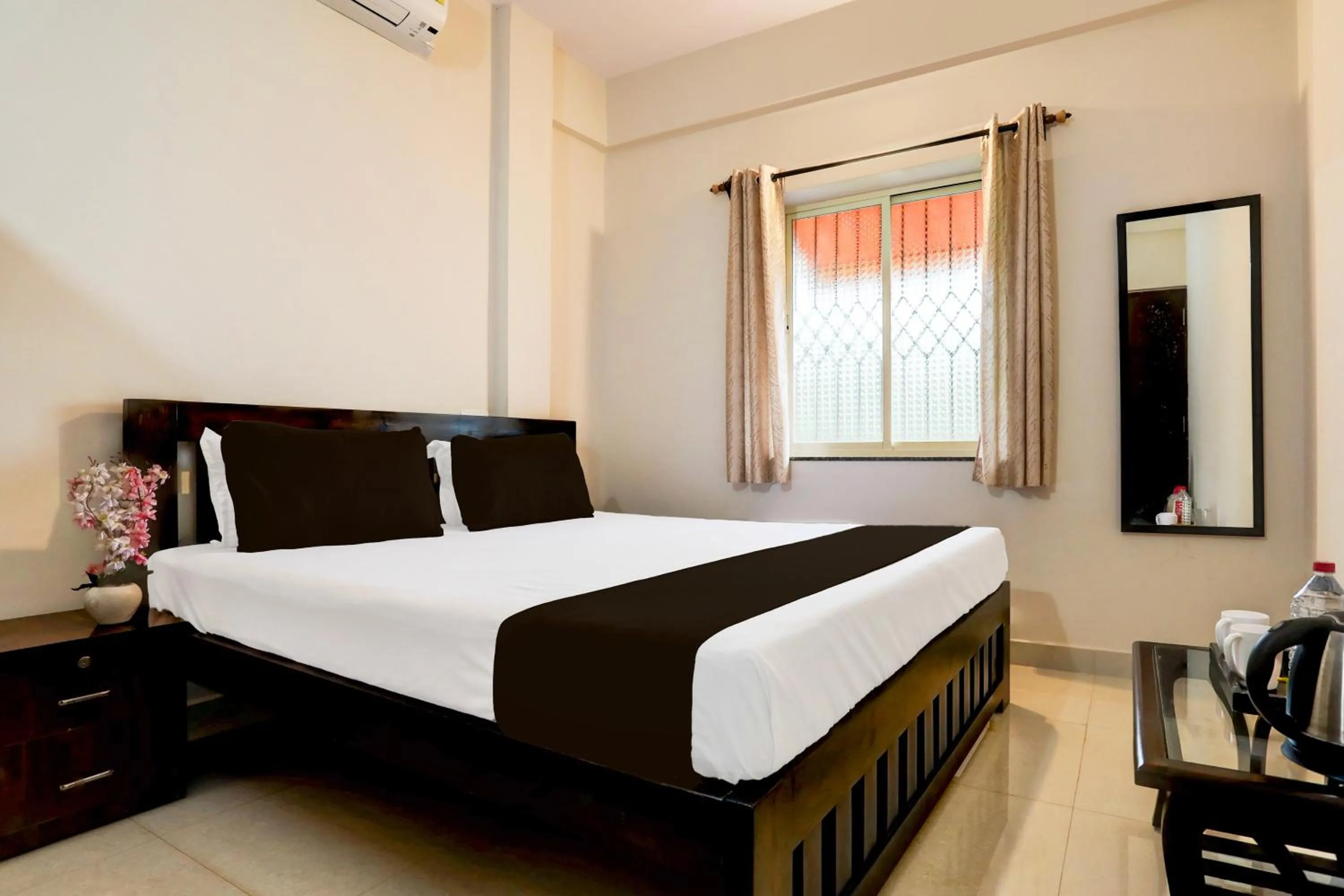 Bedroom in Hotel O Aqua Service Apartments