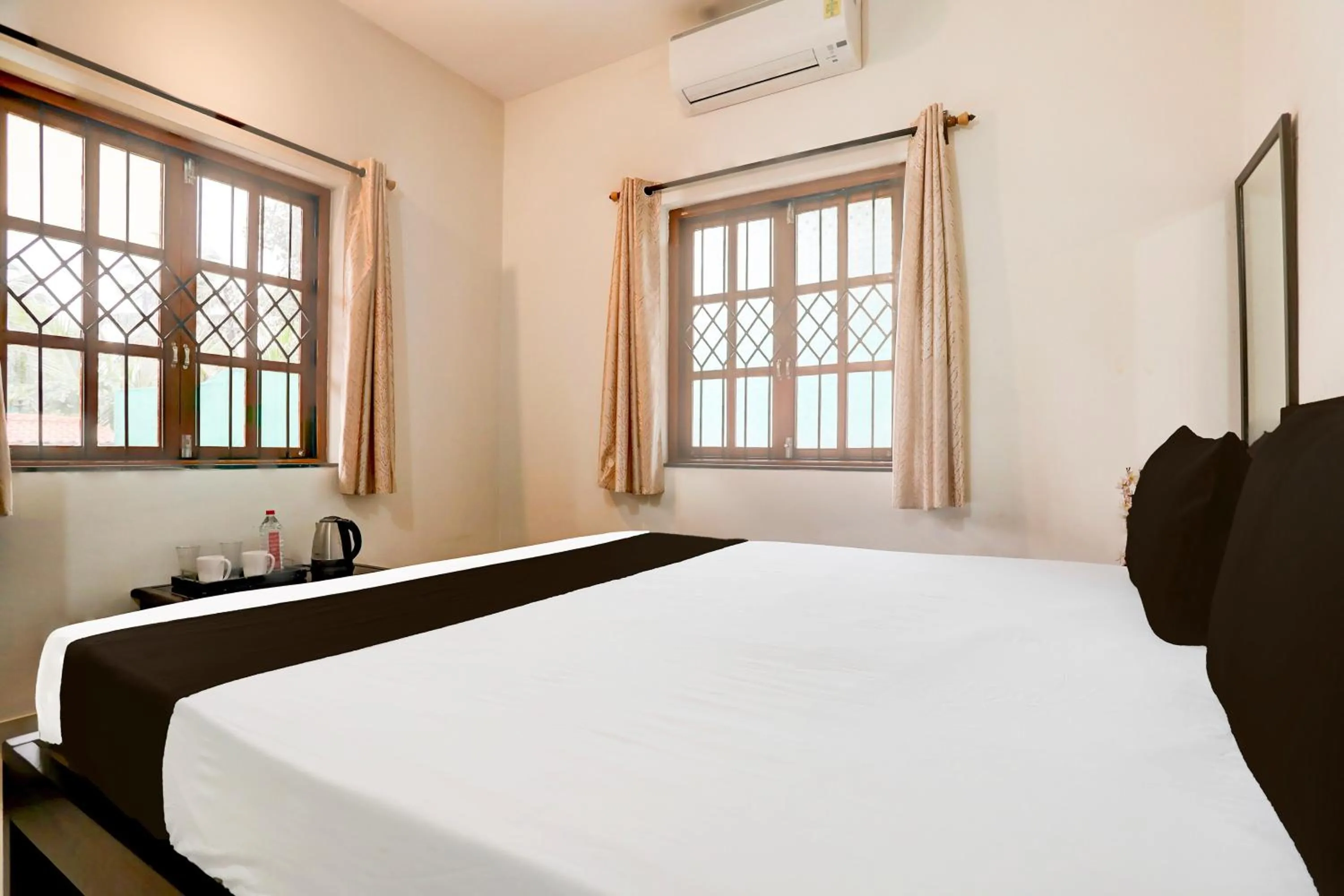 Bedroom in Hotel O Aqua Service Apartments