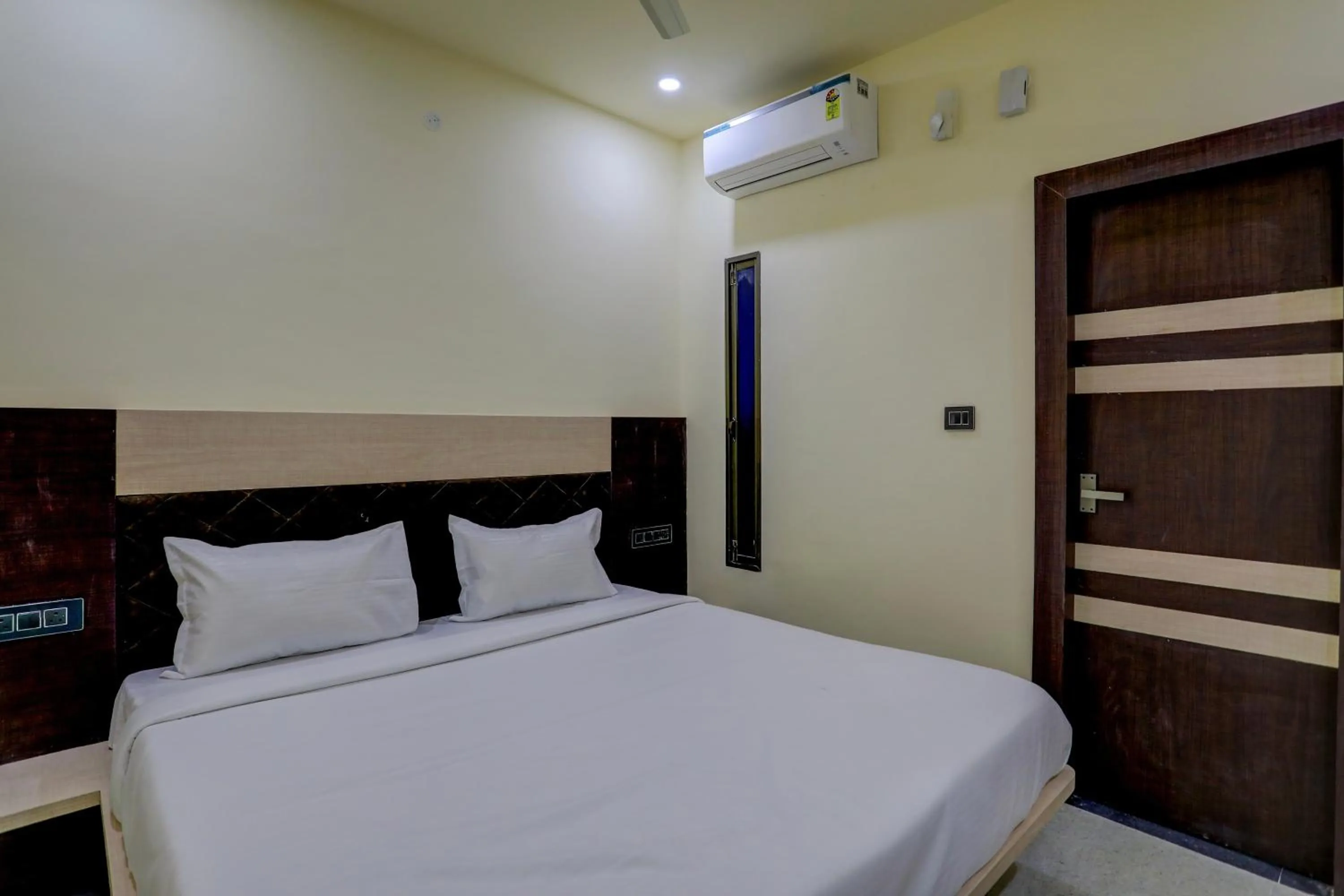 Bedroom, Bed in Hotel O Madhuram Residency