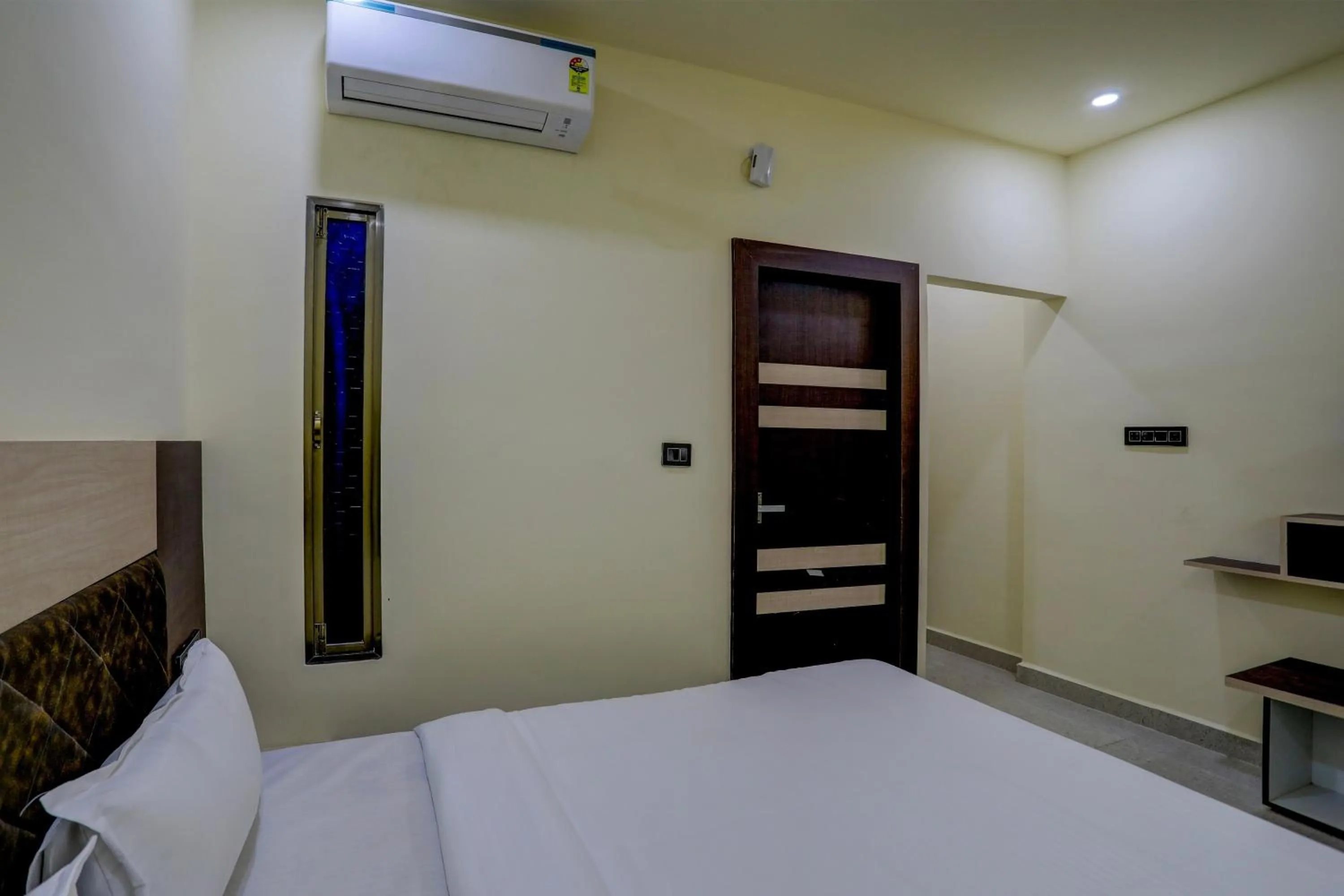 Bedroom, Bed in Hotel O Madhuram Residency