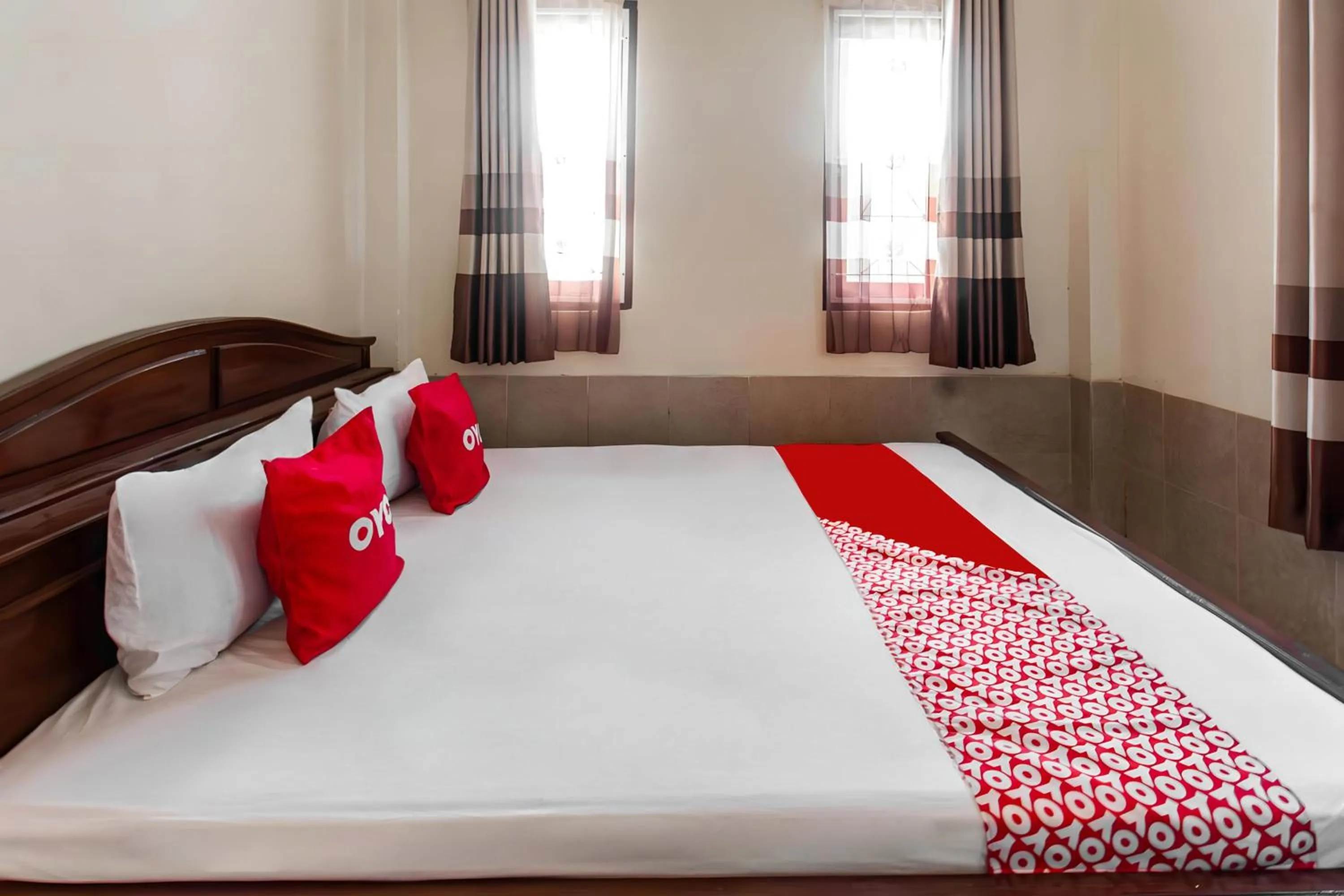 Bedroom in OYO 93582 Liani Homestay Syariah