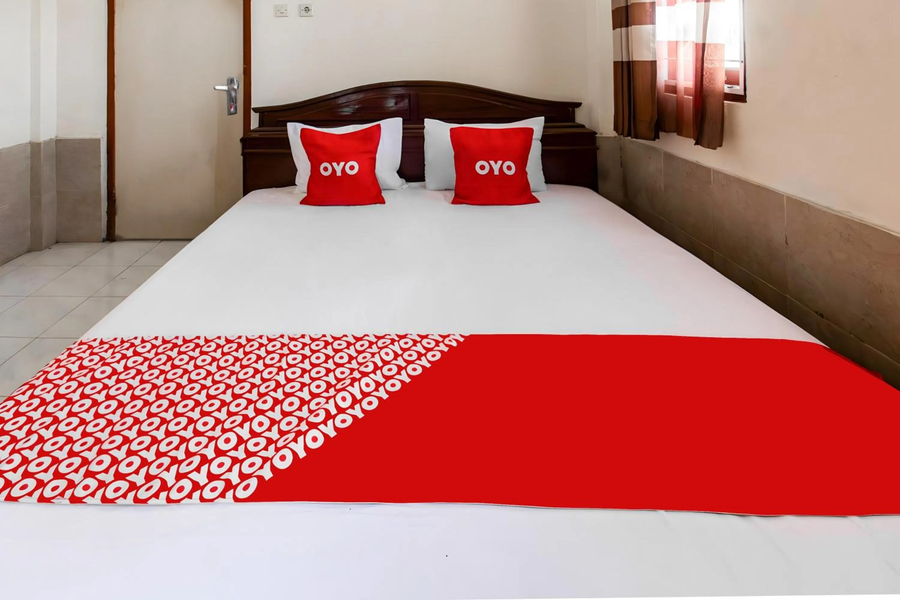 Bedroom in OYO 93582 Liani Homestay Syariah