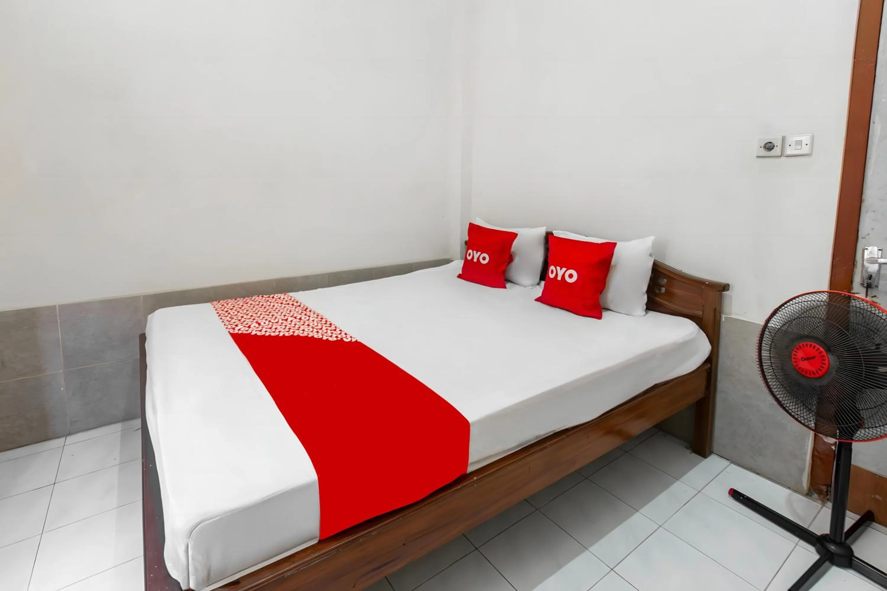 Bedroom in OYO 93582 Liani Homestay Syariah