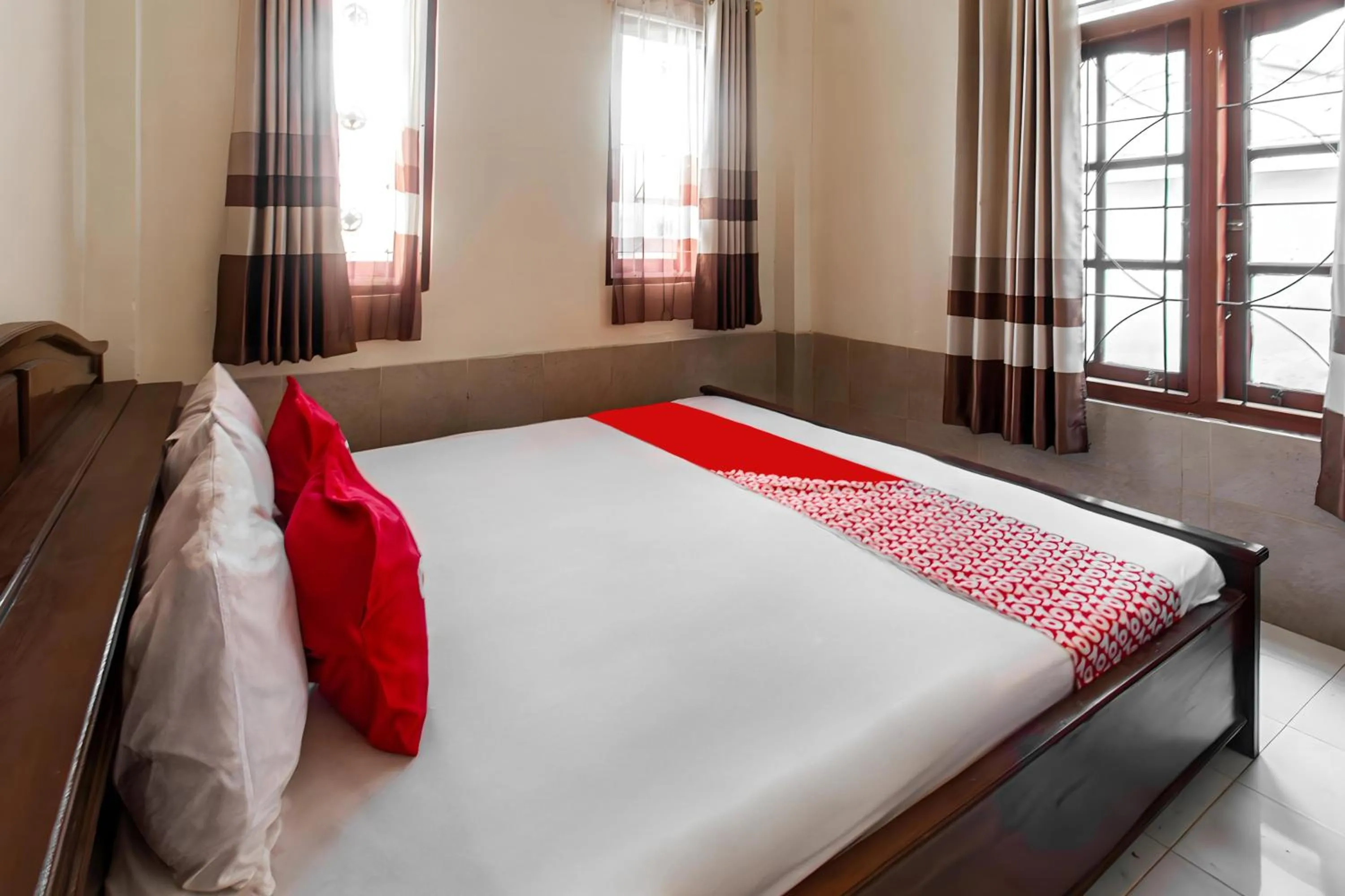 Bedroom in OYO 93582 Liani Homestay Syariah