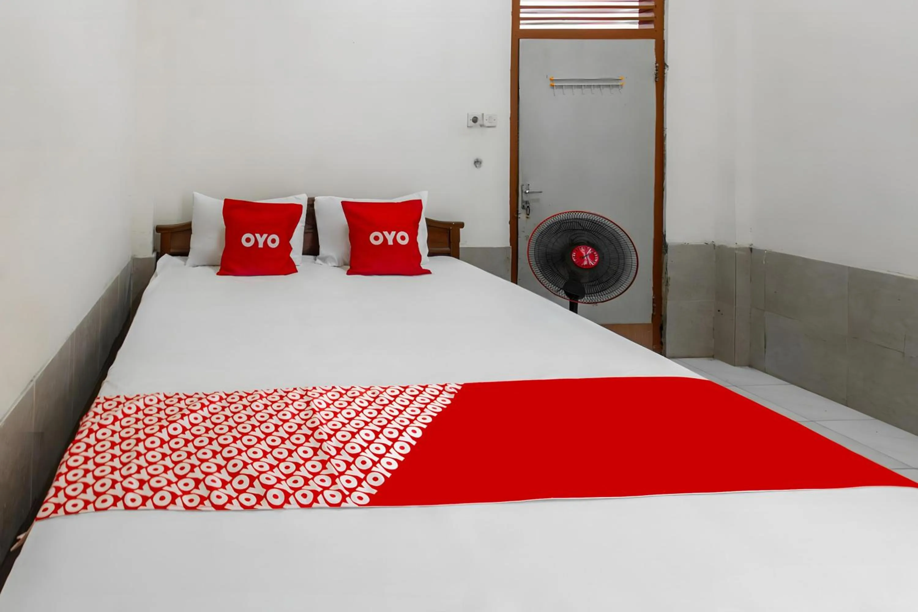 Bedroom in OYO 93582 Liani Homestay Syariah