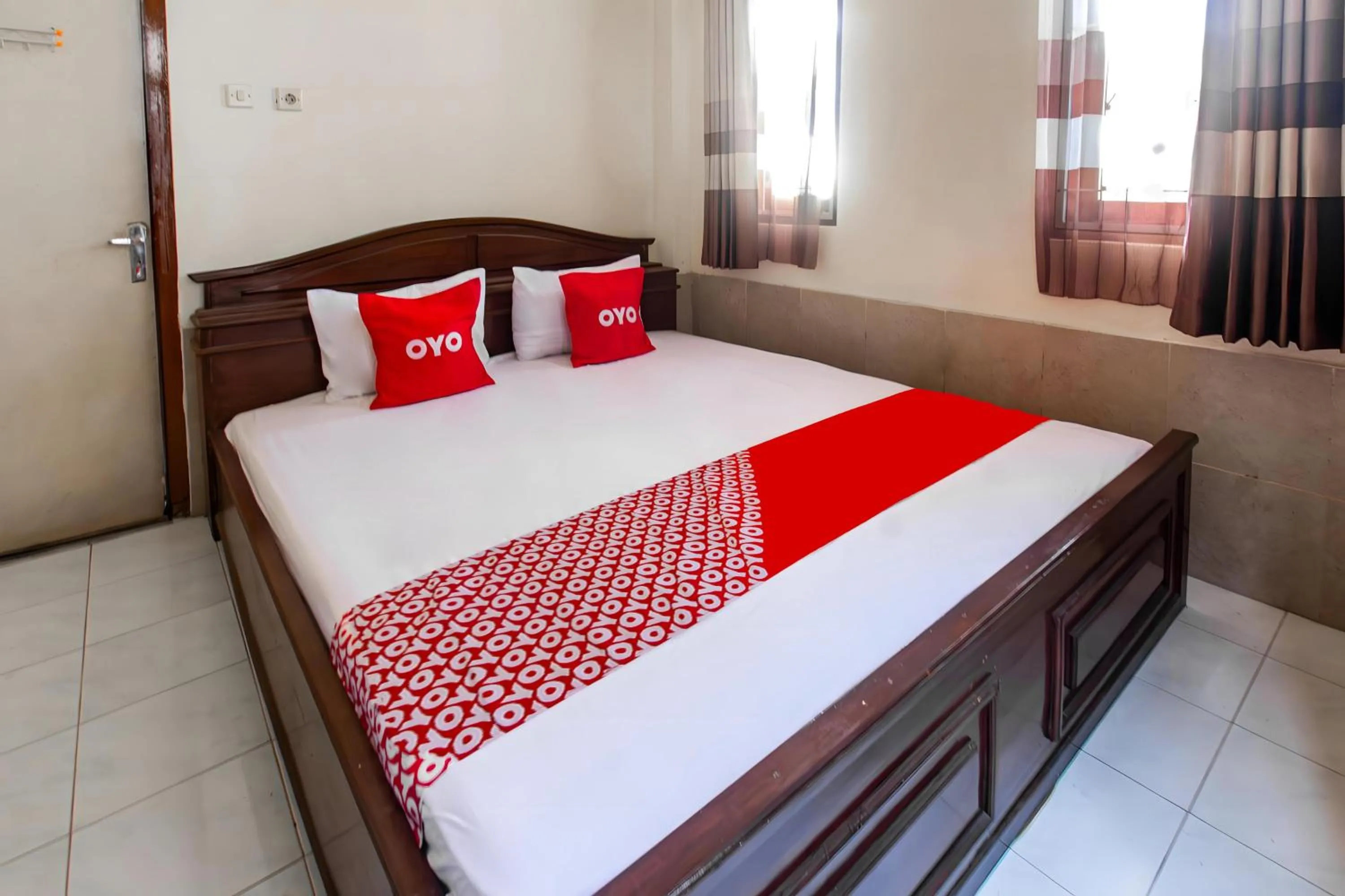 Bedroom in OYO 93582 Liani Homestay Syariah