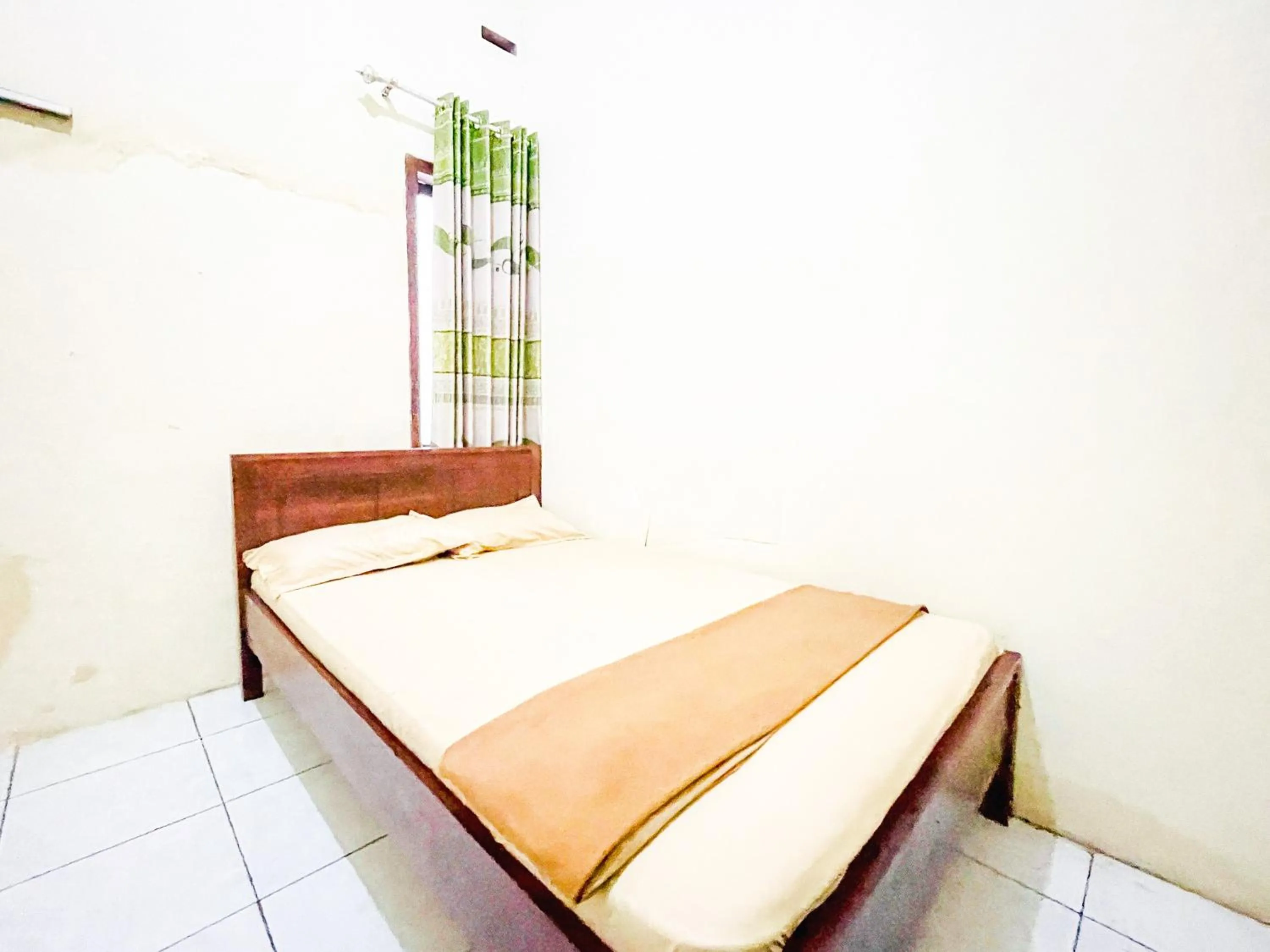 Bedroom, Bed in Wisma Air Mancur Malang Mitra RedDoorz