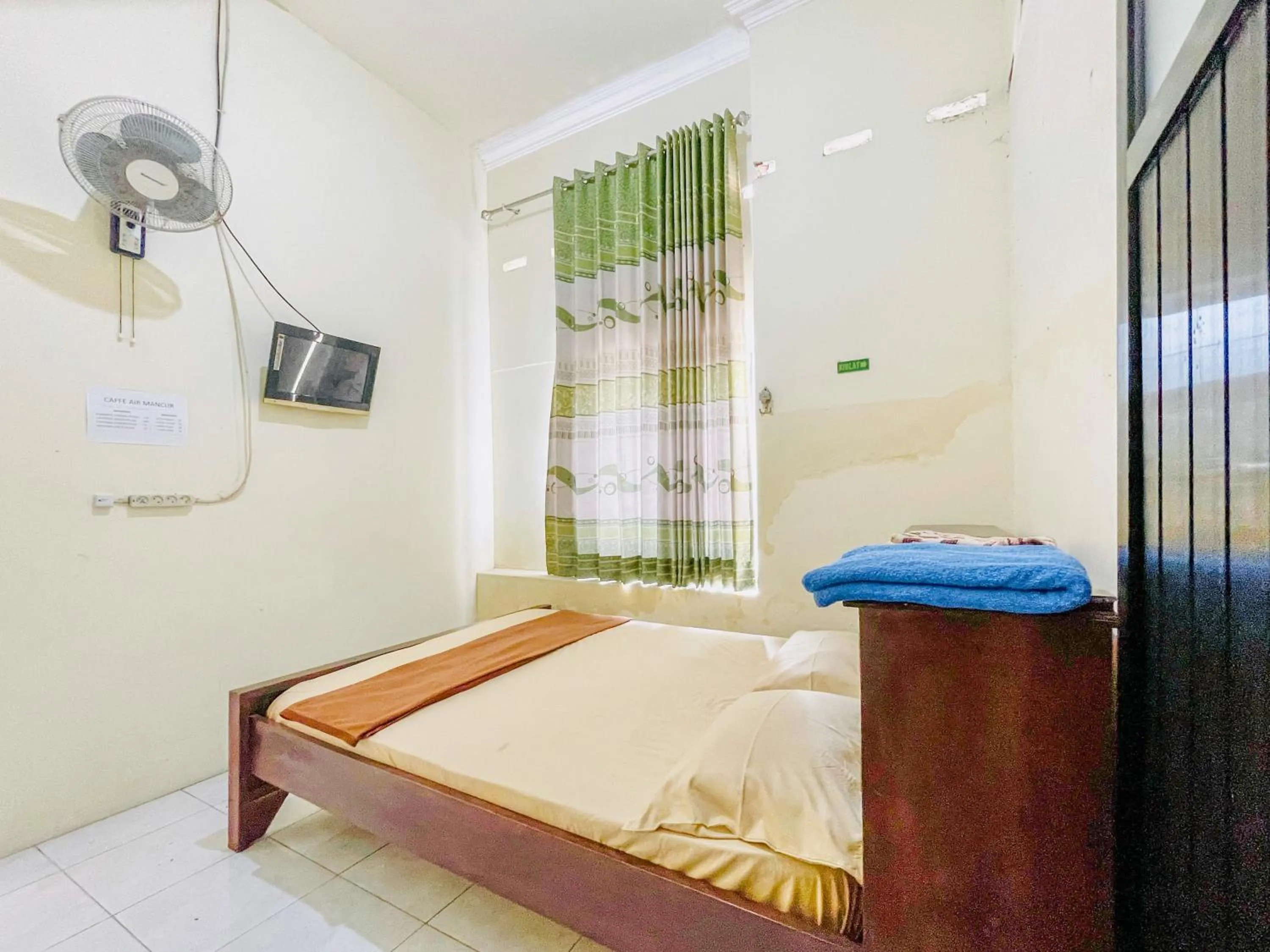 Bedroom, Bed in Wisma Air Mancur Malang Mitra RedDoorz