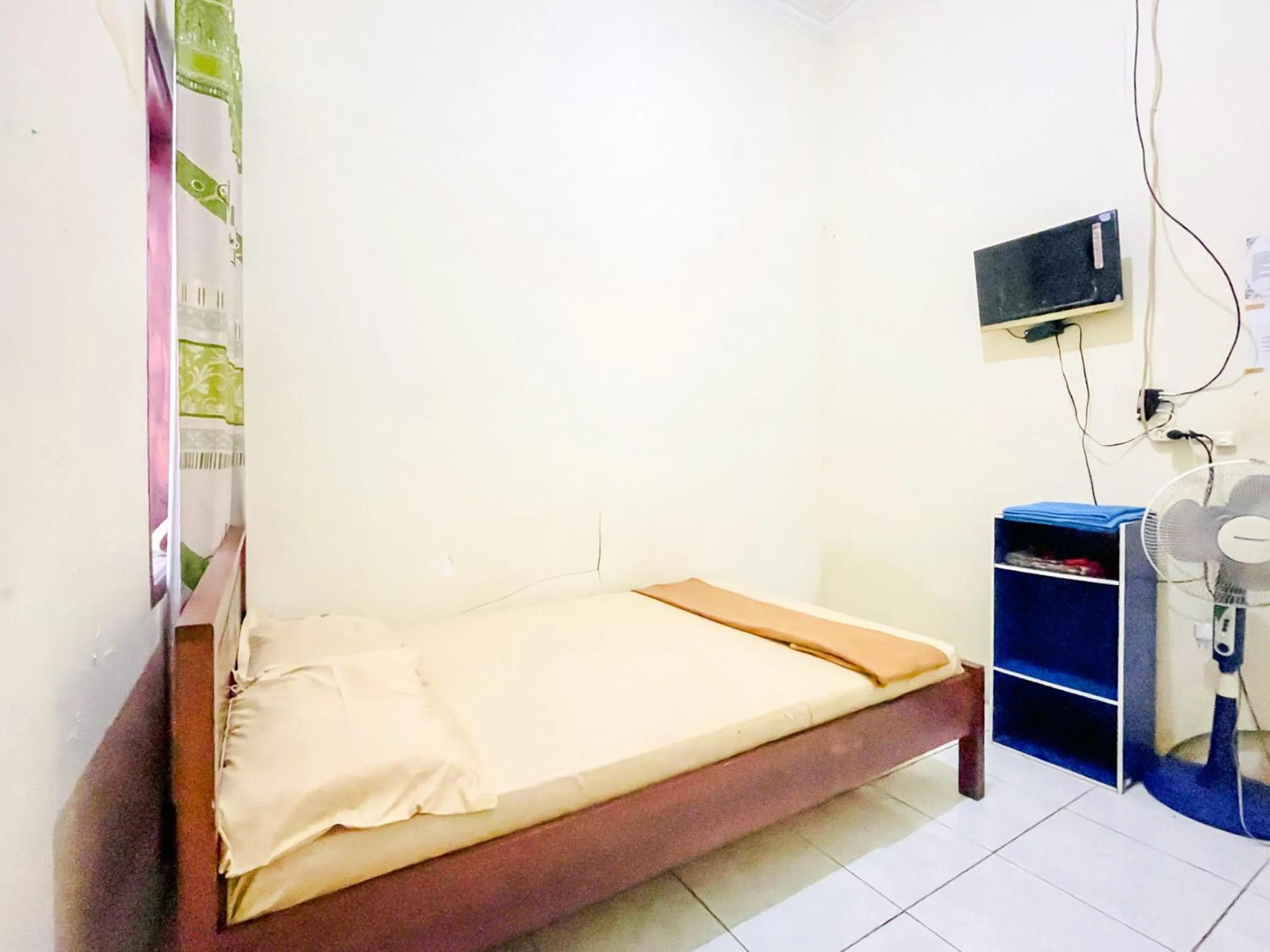 Bedroom, Bed in Wisma Air Mancur Malang Mitra RedDoorz