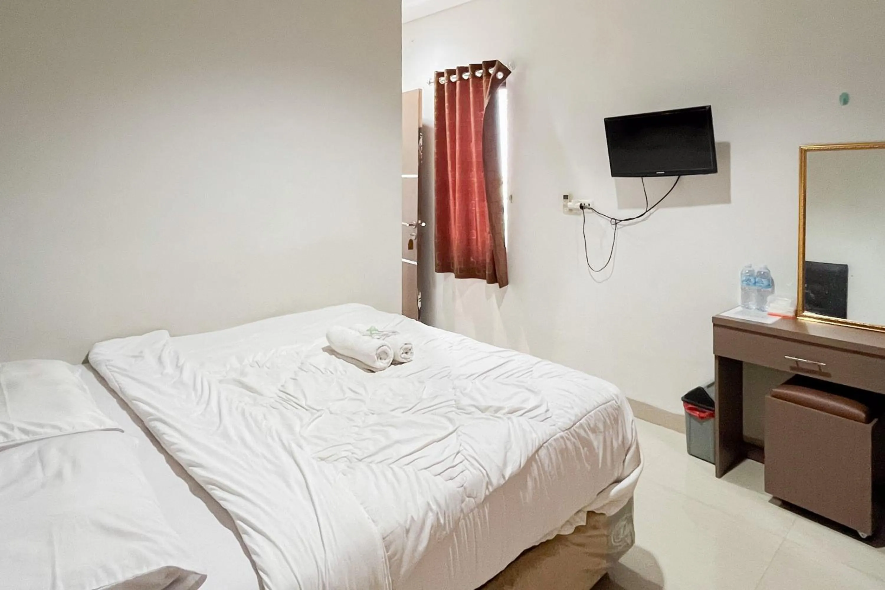 Bedroom, Bed in Urbanview Hotel Wongso Pangkal Pinang