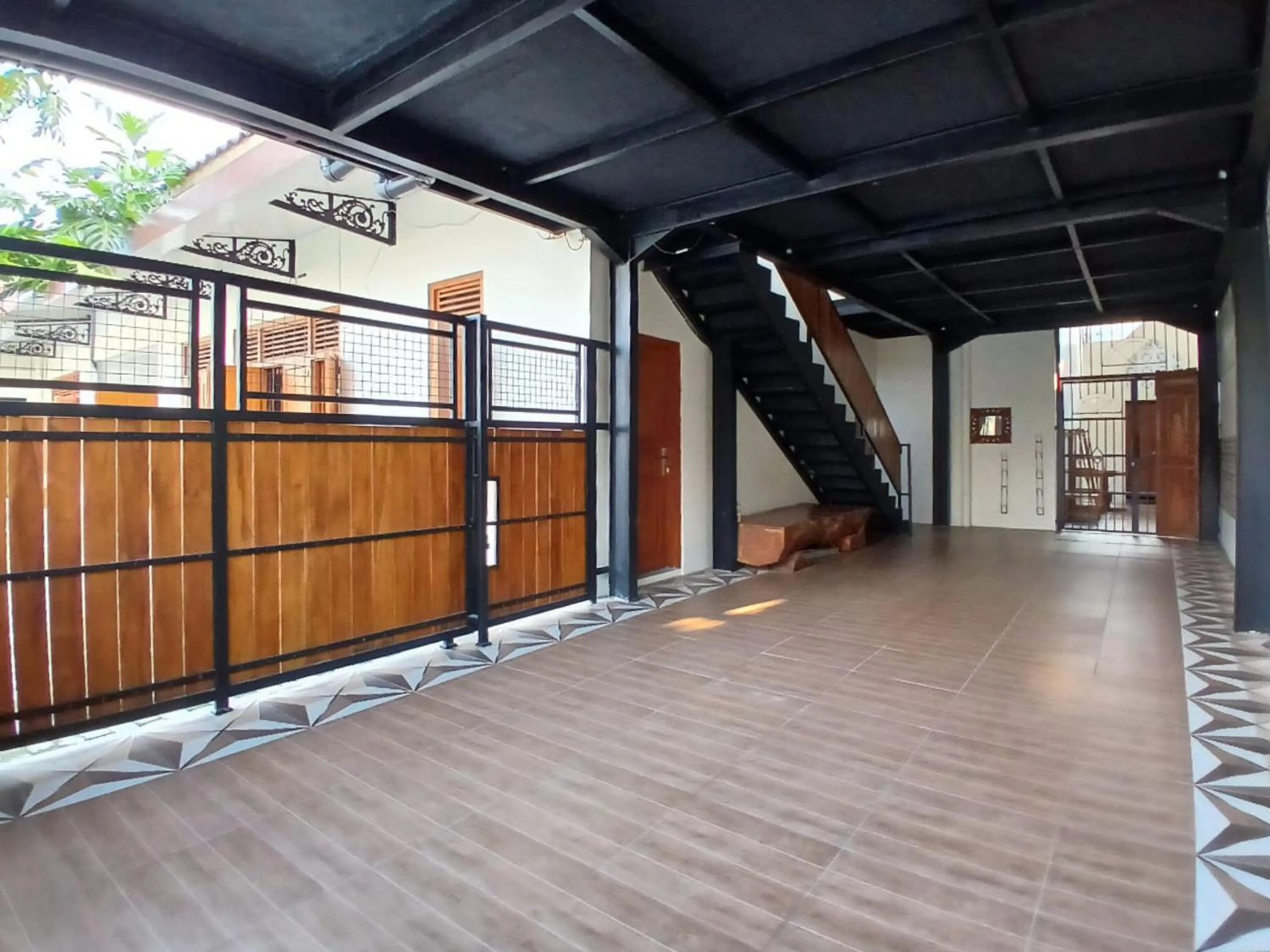 Facade/entrance in RedDoorz at Ndalem Eyyang Syariah Stasiun Klaten