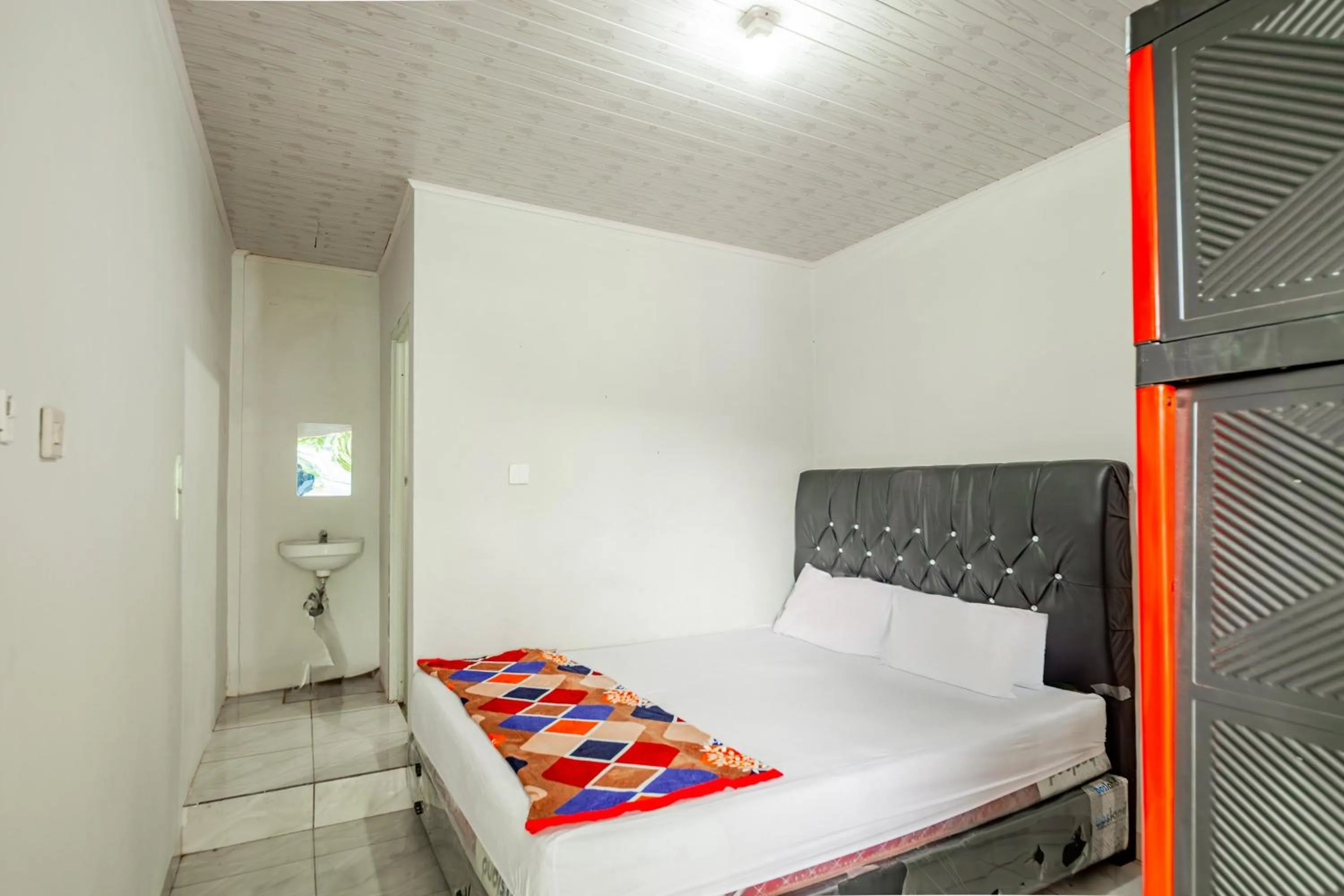 Bedroom in Hotel O Wongso Residence Syariah