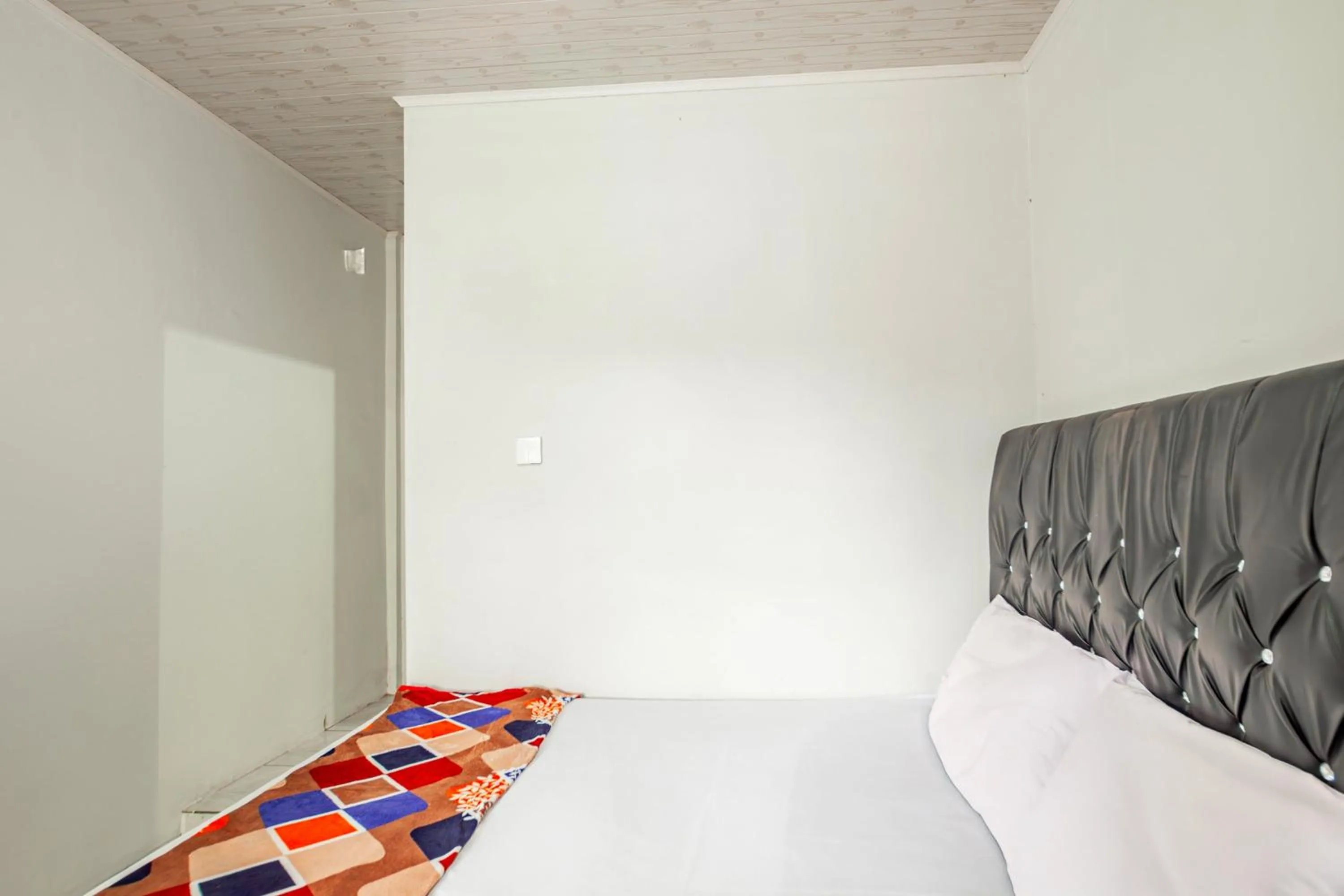 Bedroom in Hotel O Wongso Residence Syariah