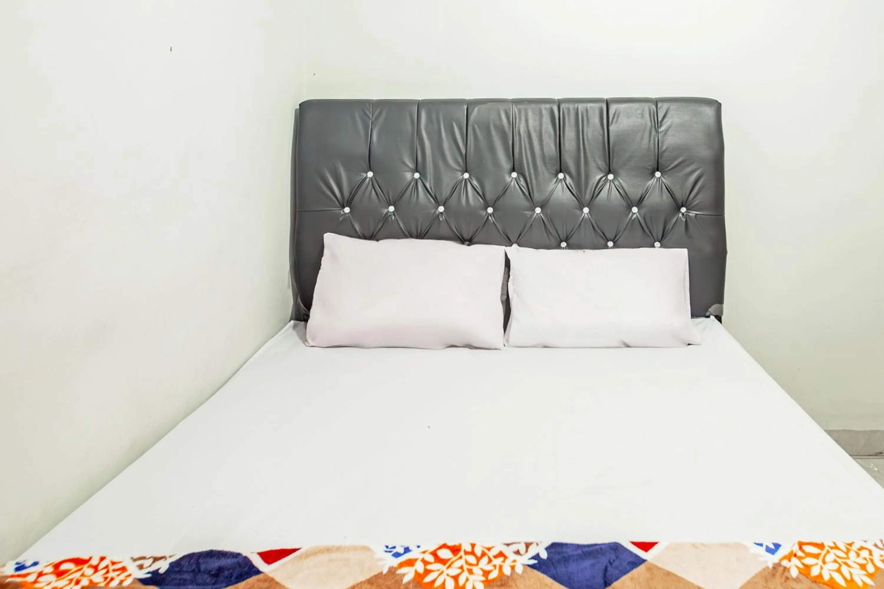 Bedroom in Hotel O Wongso Residence Syariah