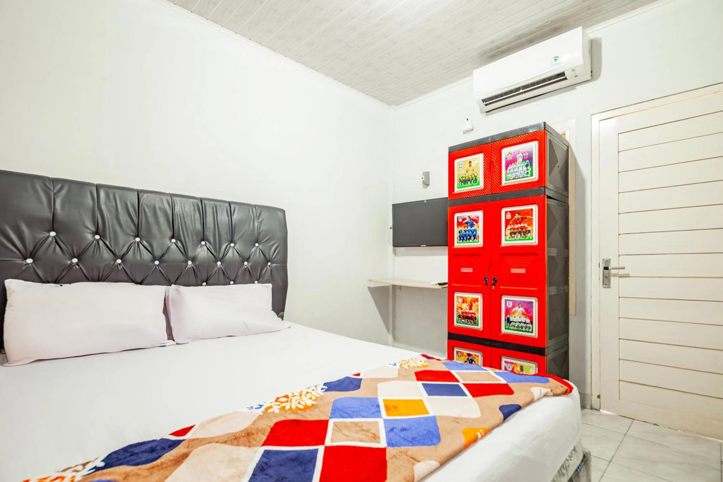 Bedroom in Hotel O Wongso Residence Syariah