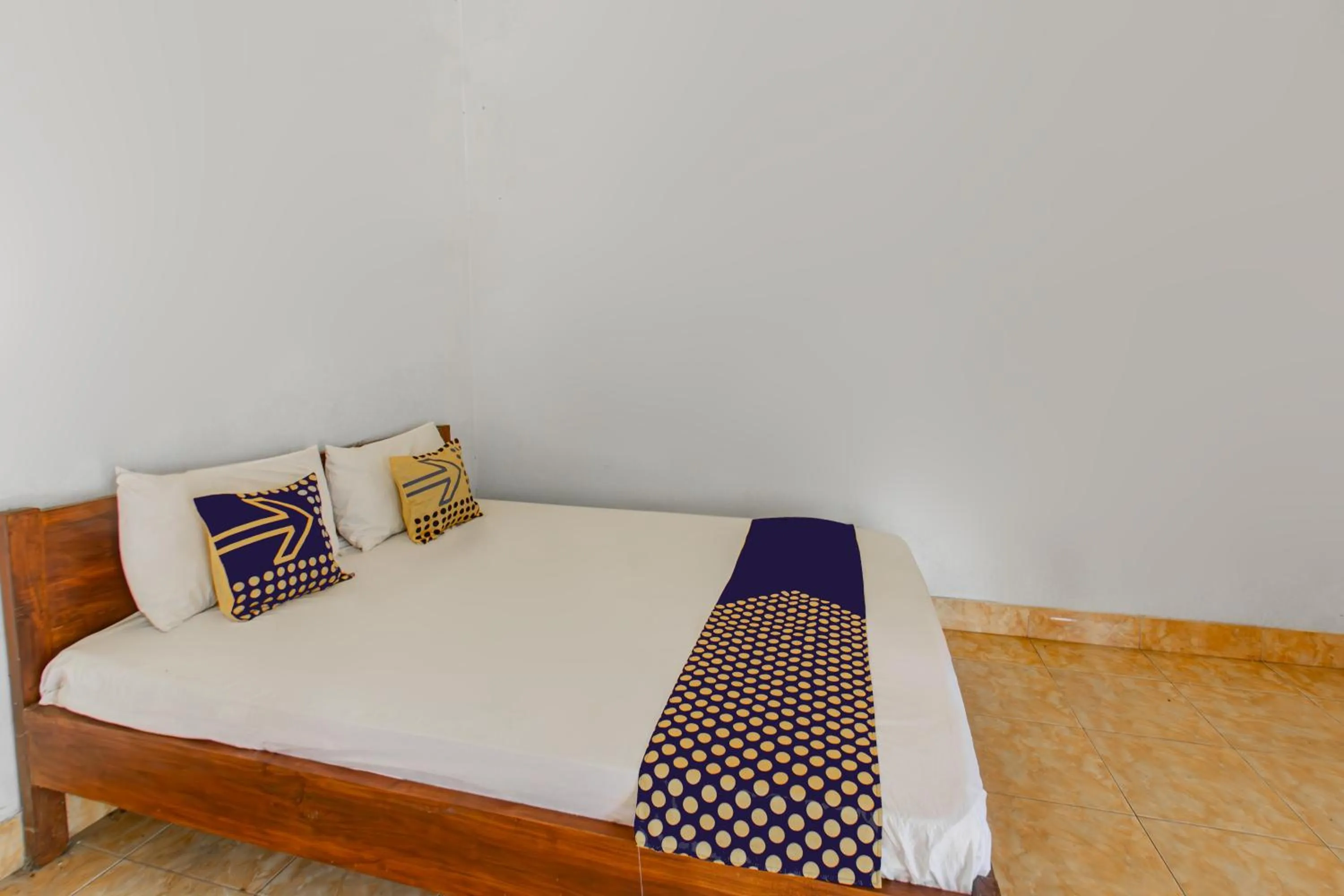 Bedroom, Bed in Hotel O Kaila Guesthouse