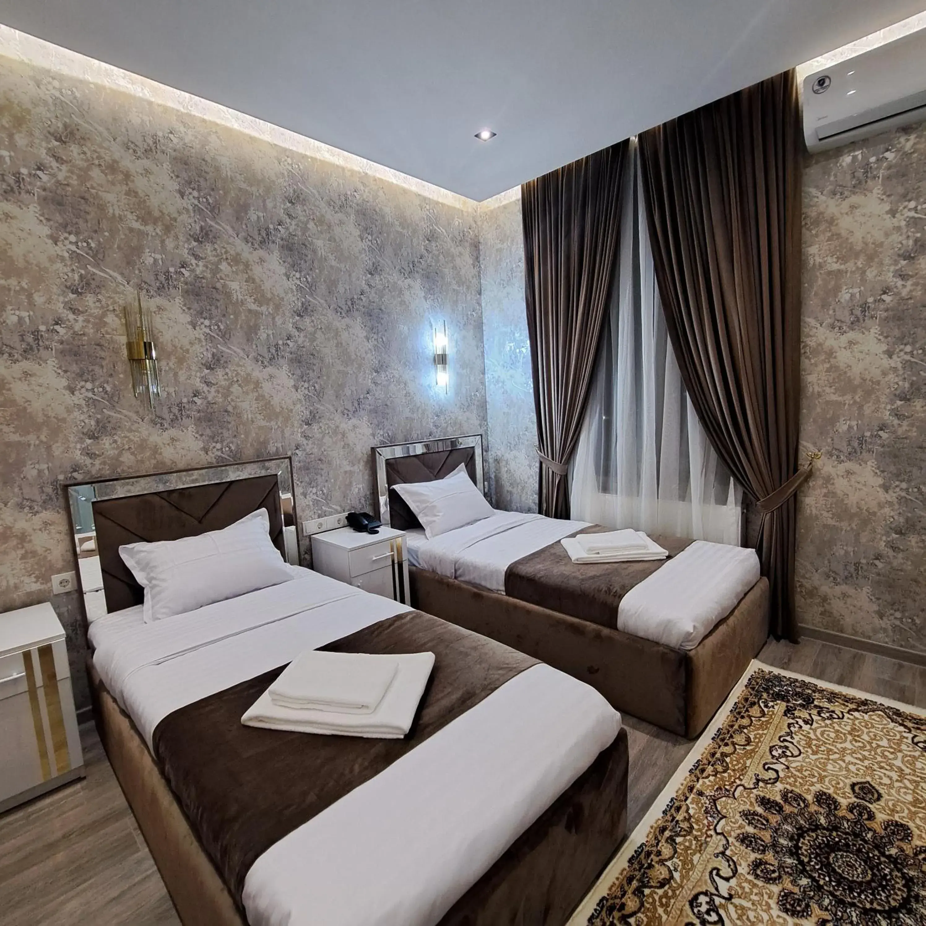 Deluxe Twin Room - single occupancy in The Afrosiyob Ok Deluxe Twin Room - single occupancy in The Afrosiyob Ok