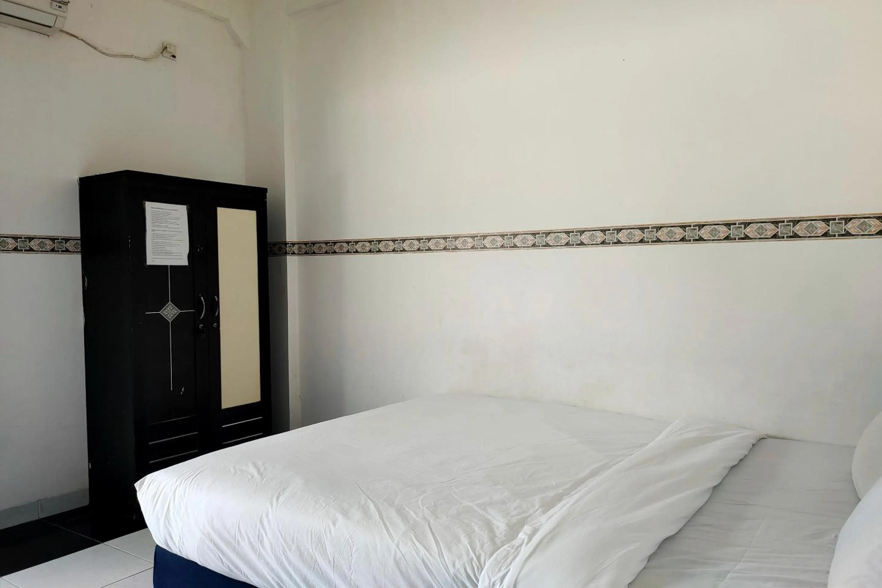 Bedroom in Hotel O Pondok Baruga 777 Near Sarewo Musik Studio Kendari