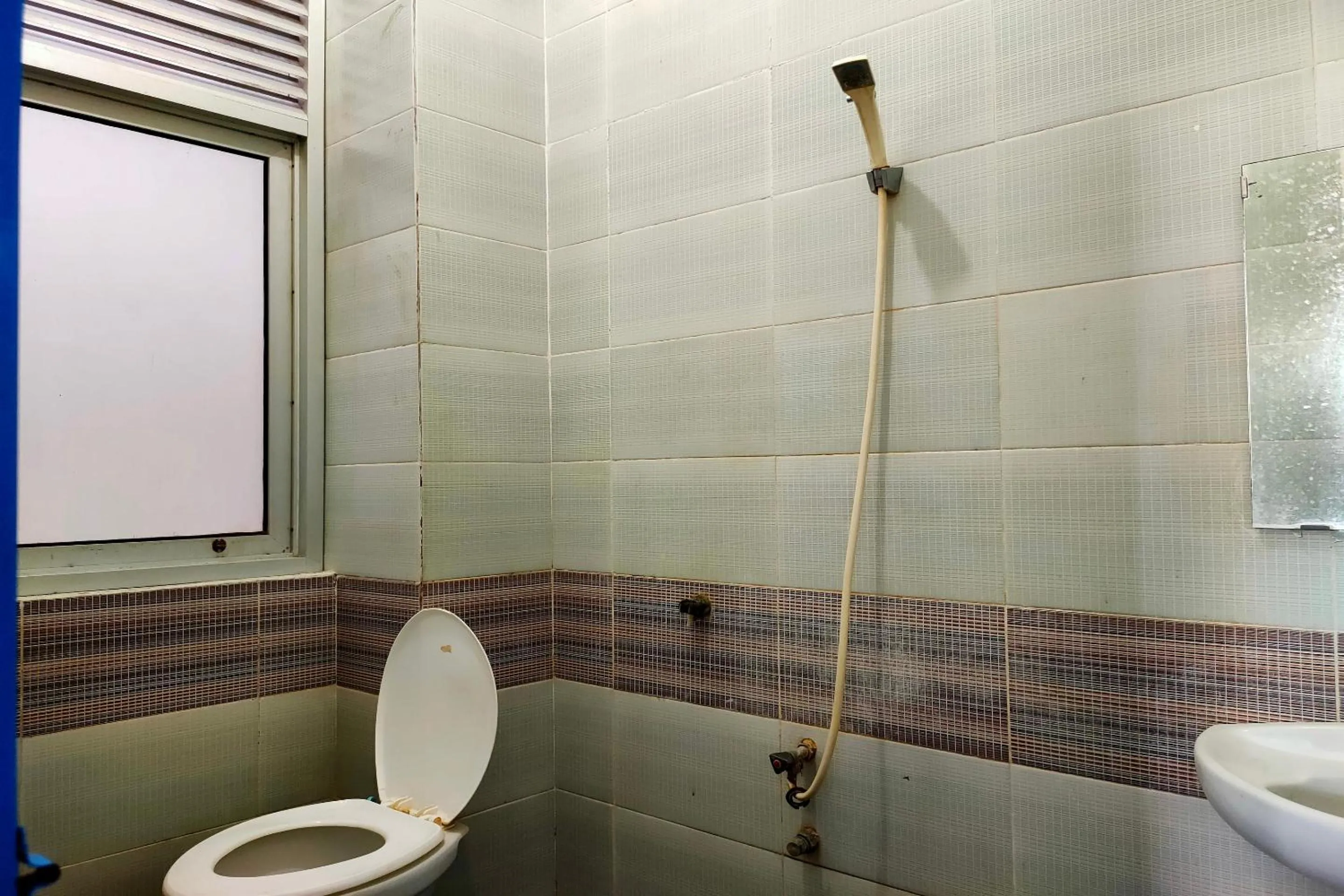 Bedroom in Hotel O Pondok Baruga 777 Near Sarewo Musik Studio Kendari