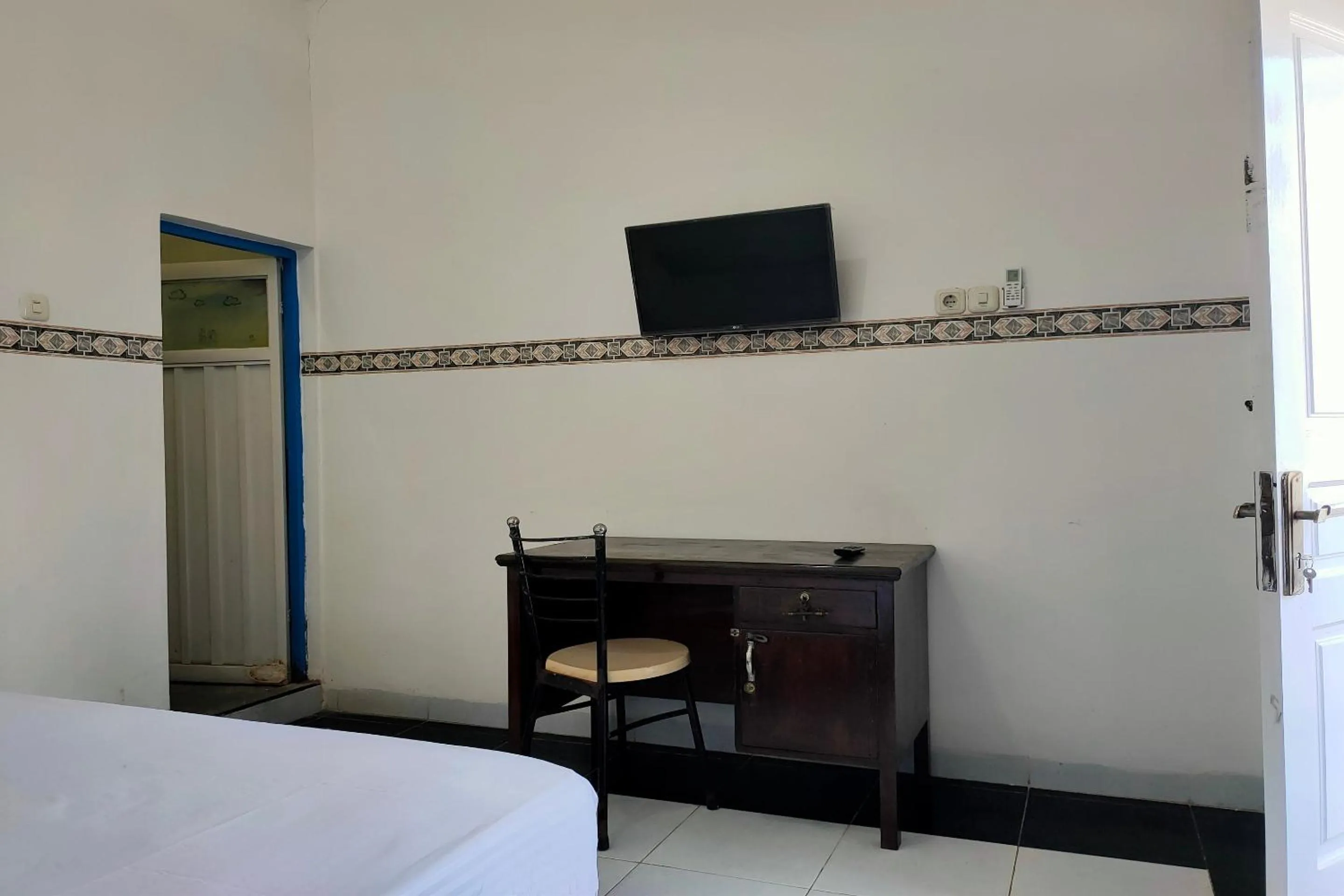 Bedroom in Hotel O Pondok Baruga 777 Near Sarewo Musik Studio Kendari