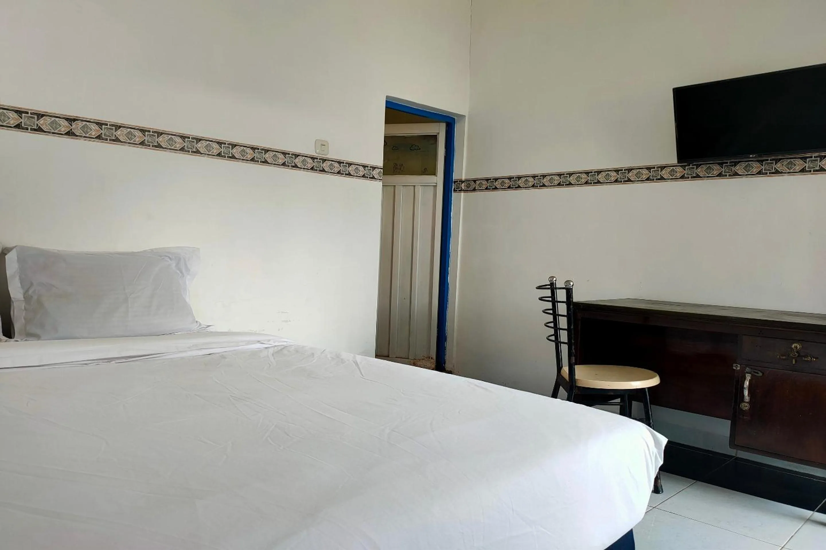 Bedroom in Hotel O Pondok Baruga 777 Near Sarewo Musik Studio Kendari