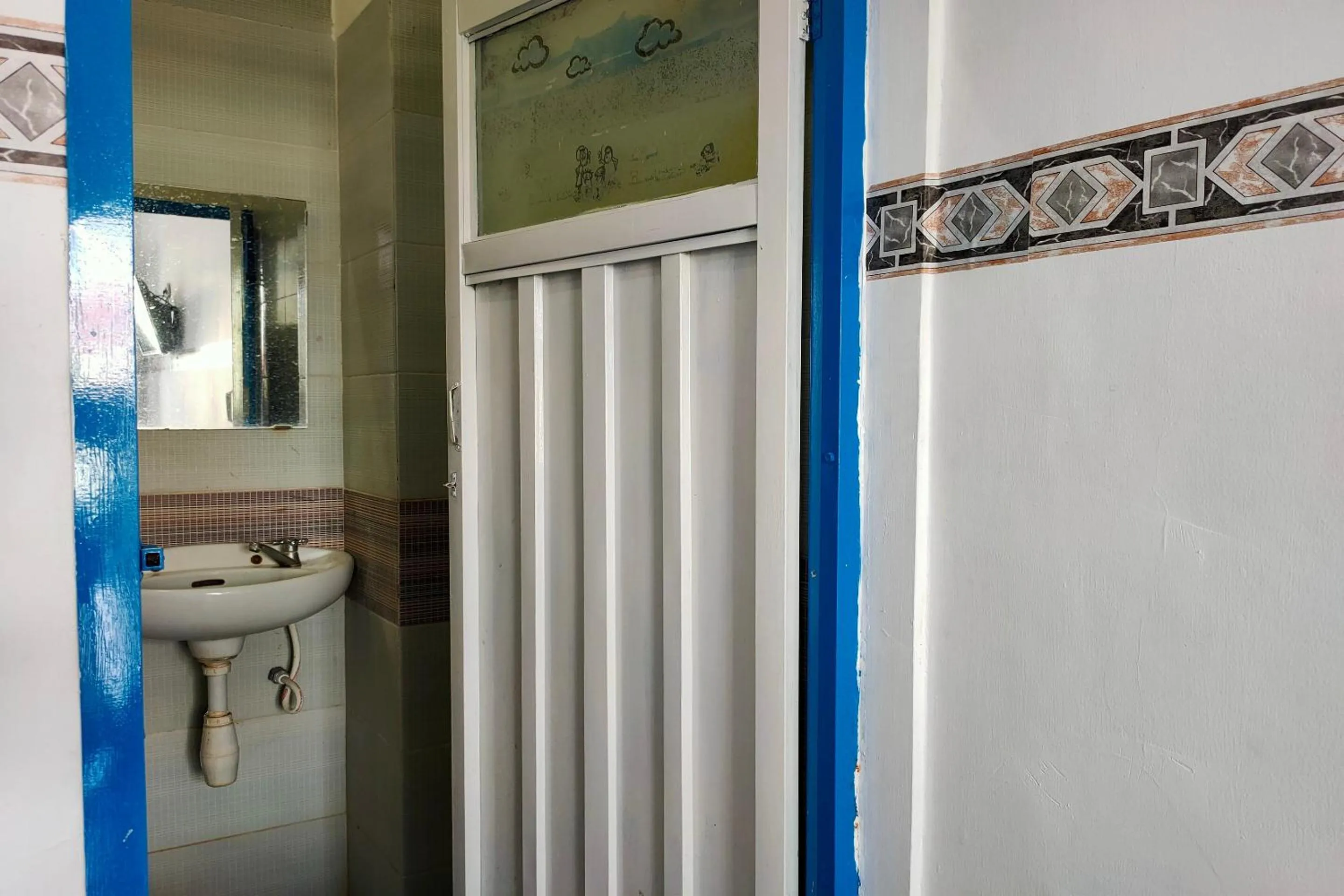 Bedroom in Hotel O Pondok Baruga 777 Near Sarewo Musik Studio Kendari