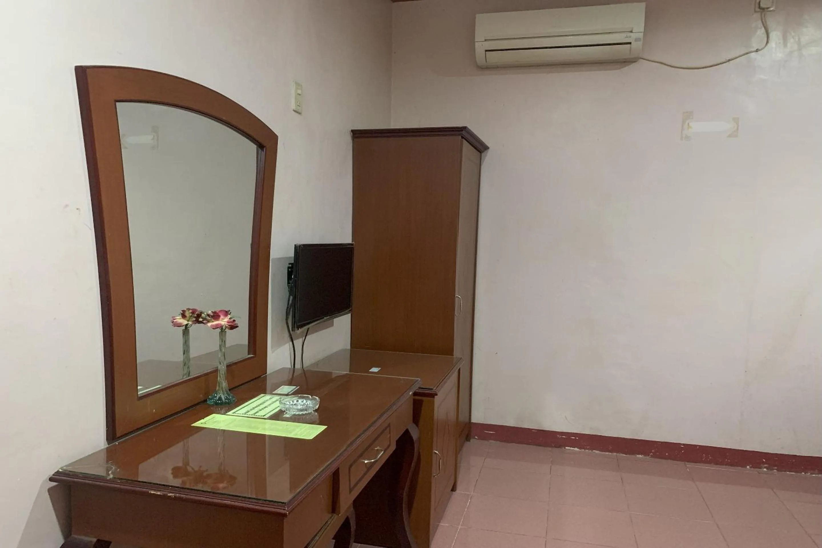 Bedroom in Hotel O Pondok Baruga 777 Near Sarewo Musik Studio Kendari