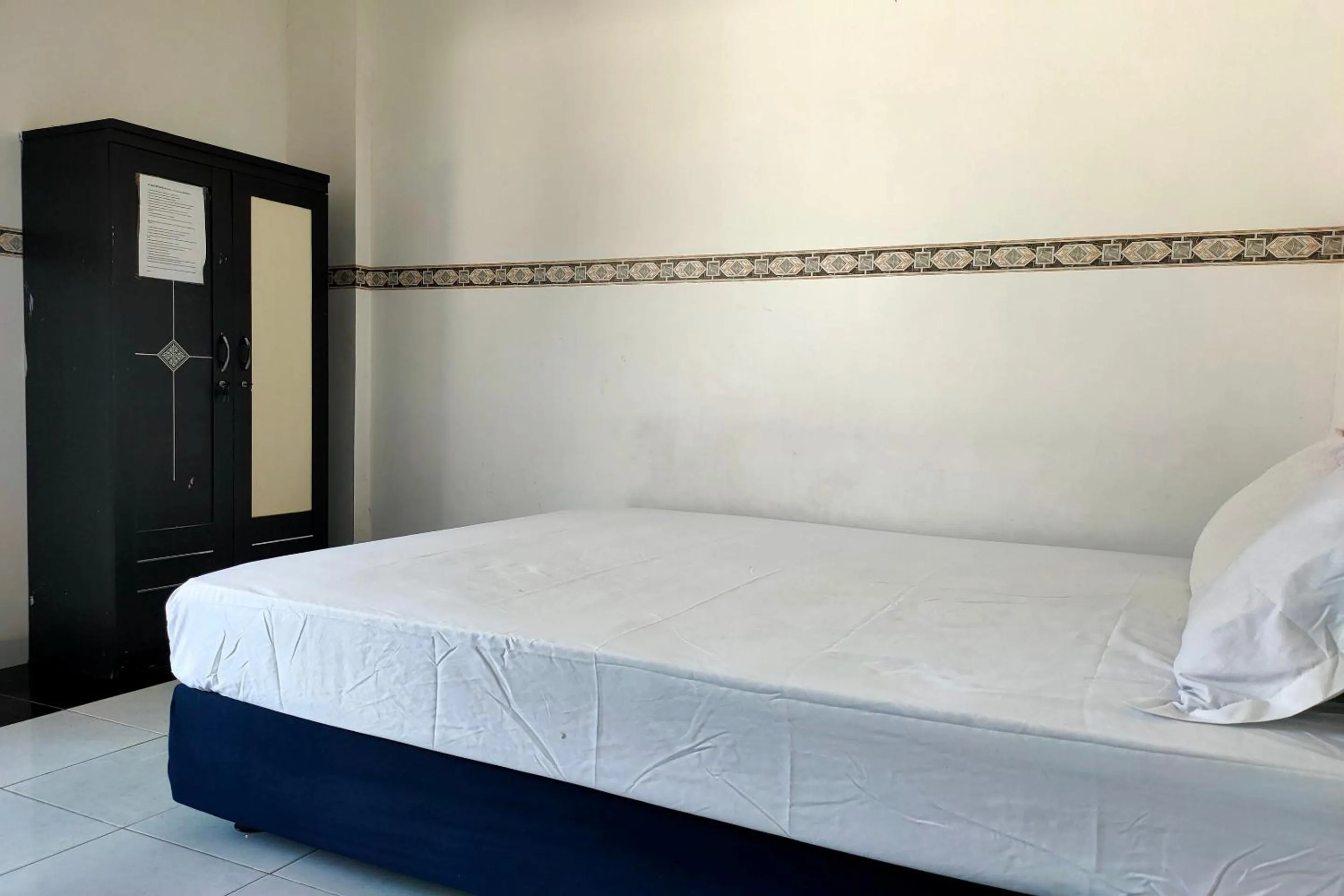 Bedroom in Hotel O Pondok Baruga 777 Near Sarewo Musik Studio Kendari