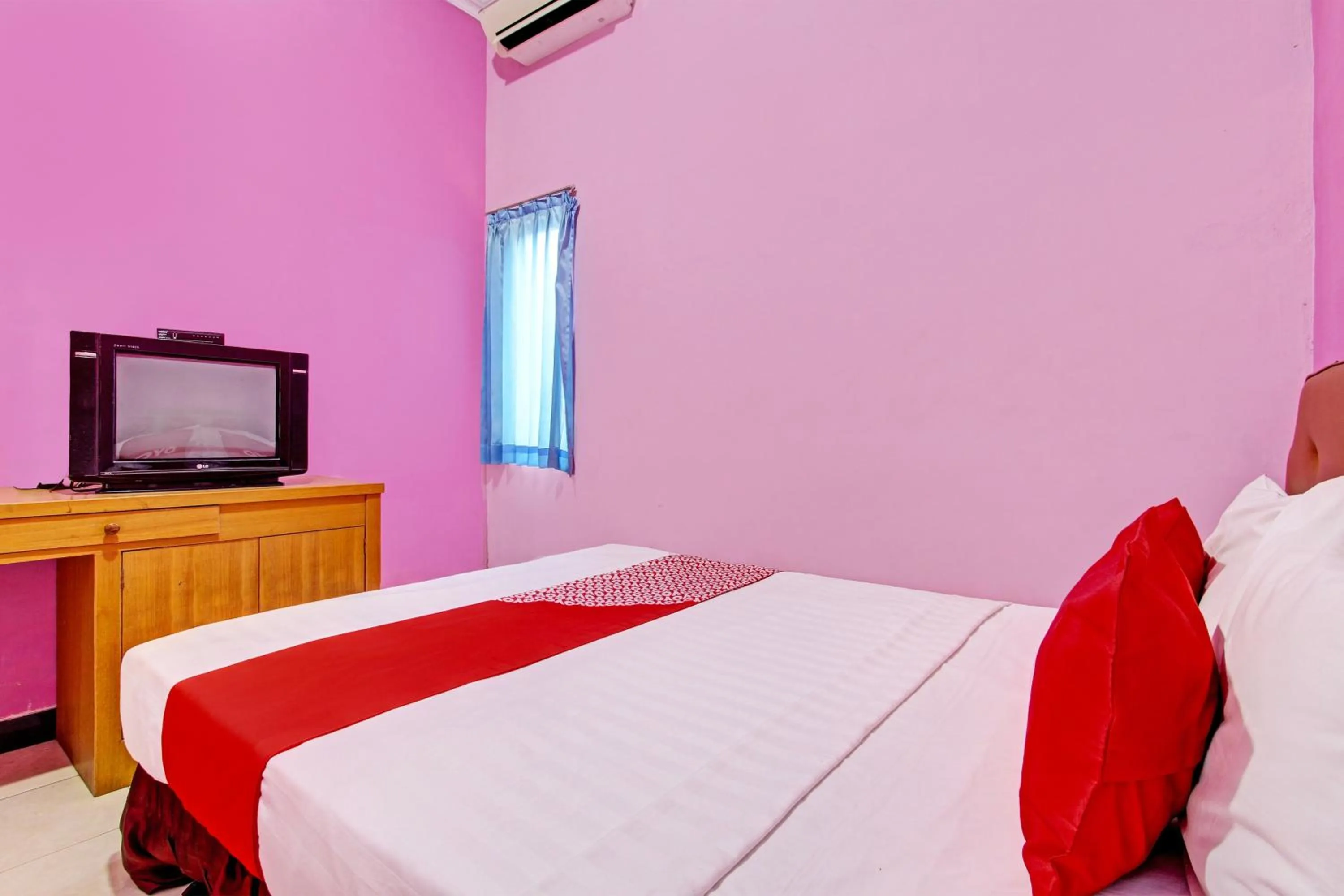 Bedroom in OYO 93660 New Family Hotel Syariah