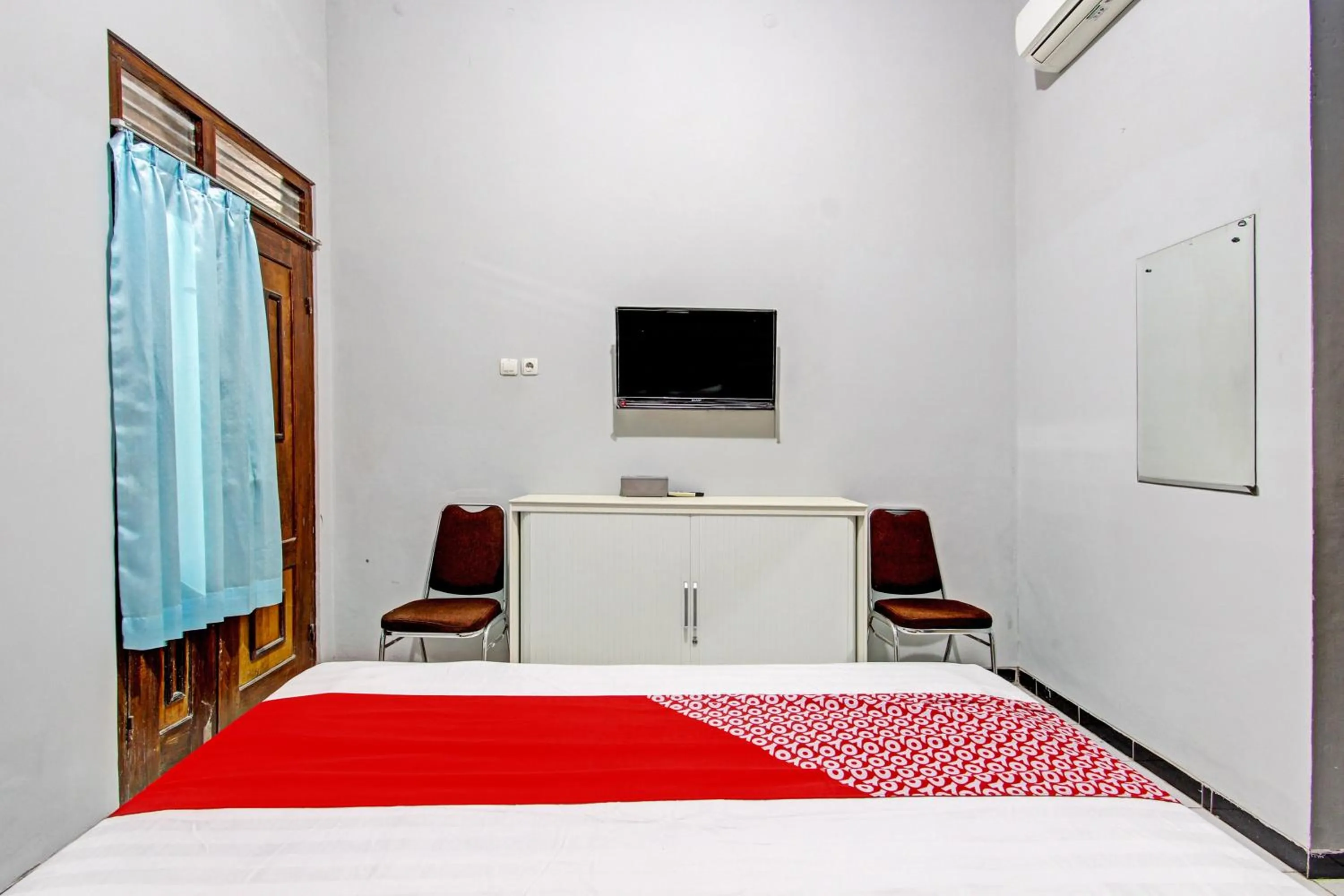 Bedroom in OYO 93660 New Family Hotel Syariah