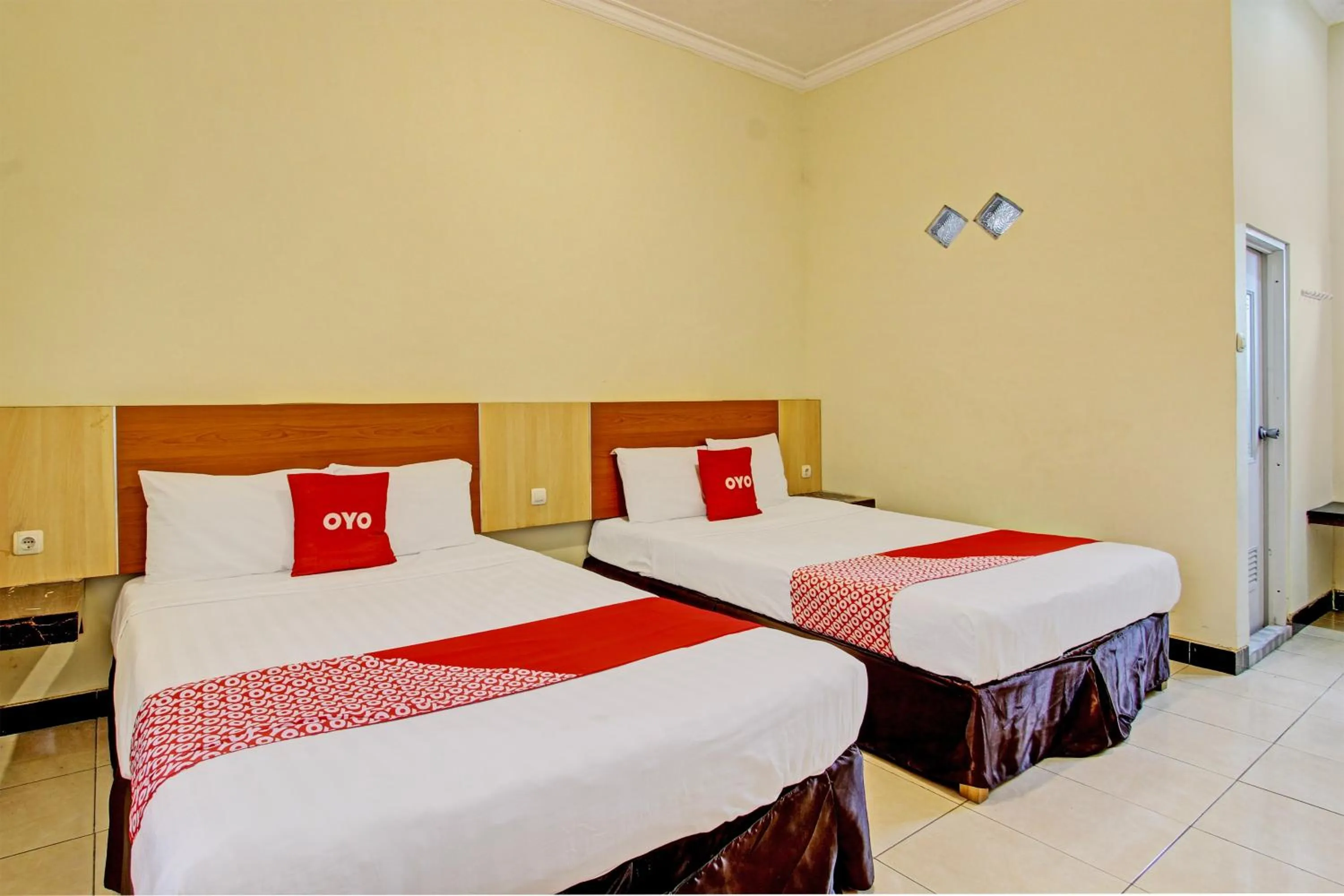Bedroom in OYO 93660 New Family Hotel Syariah