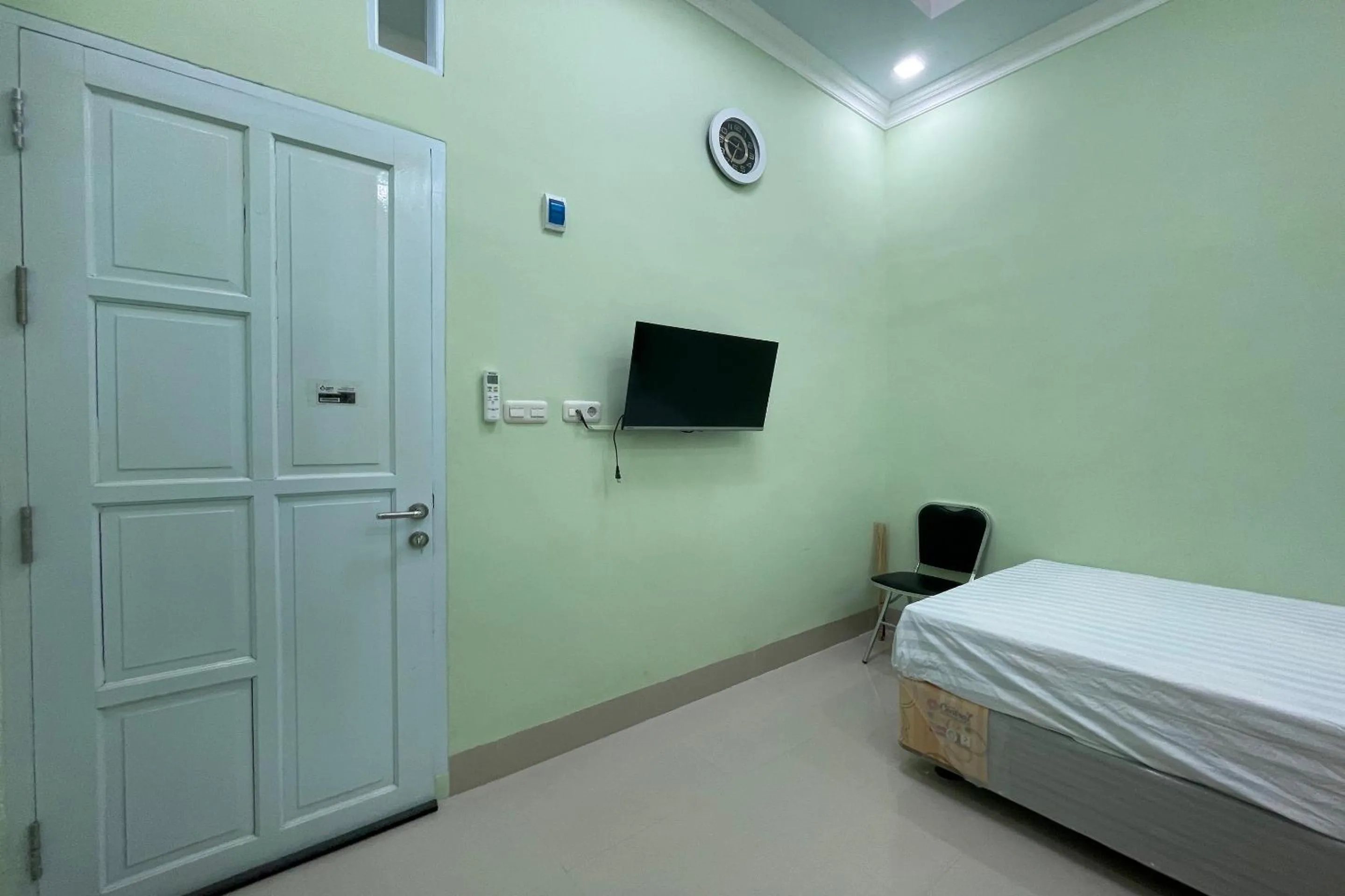 Bedroom, Bed in Hotel O Homestay Purirano