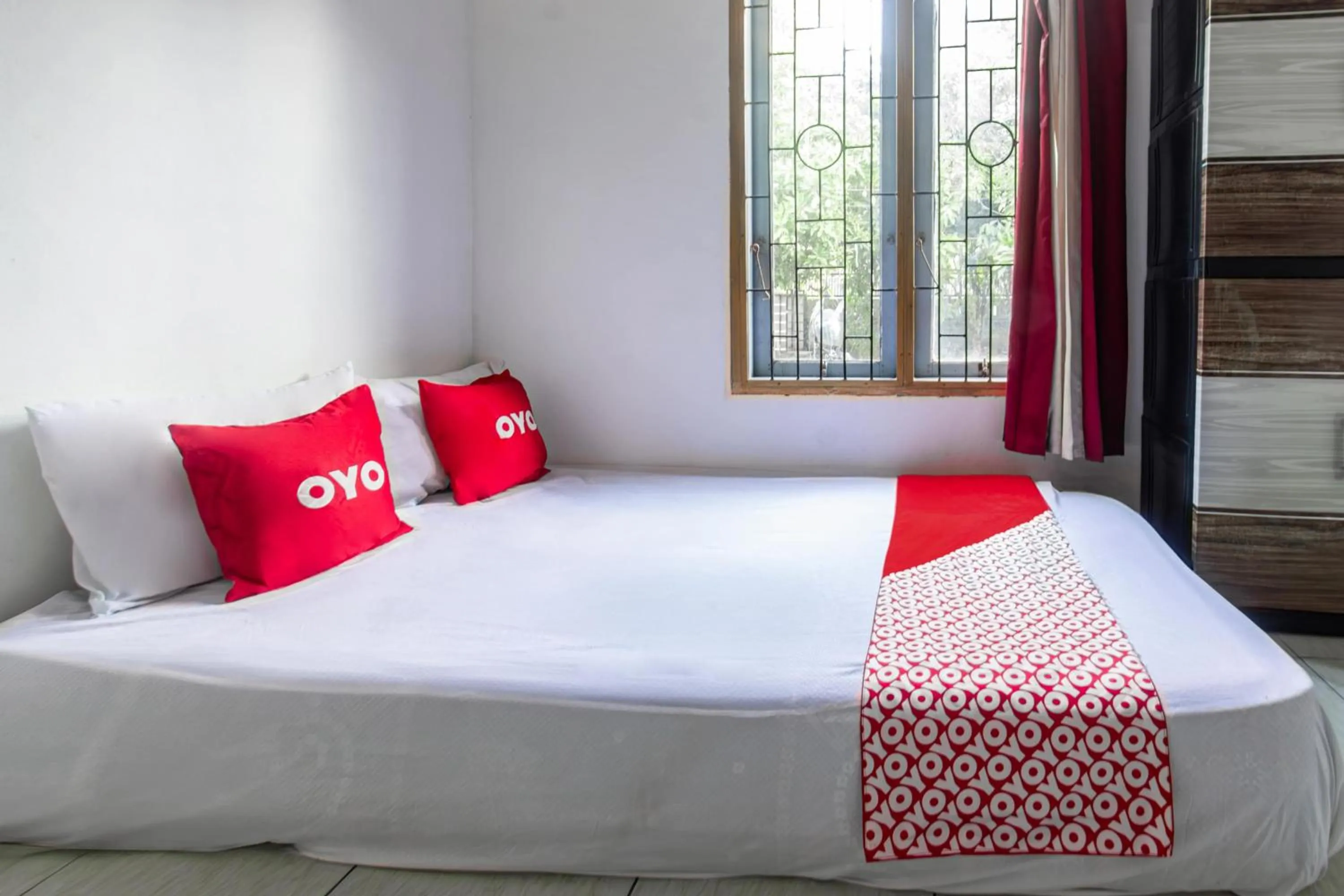 Bedroom, Bed in Hotel O Lestari Homestay