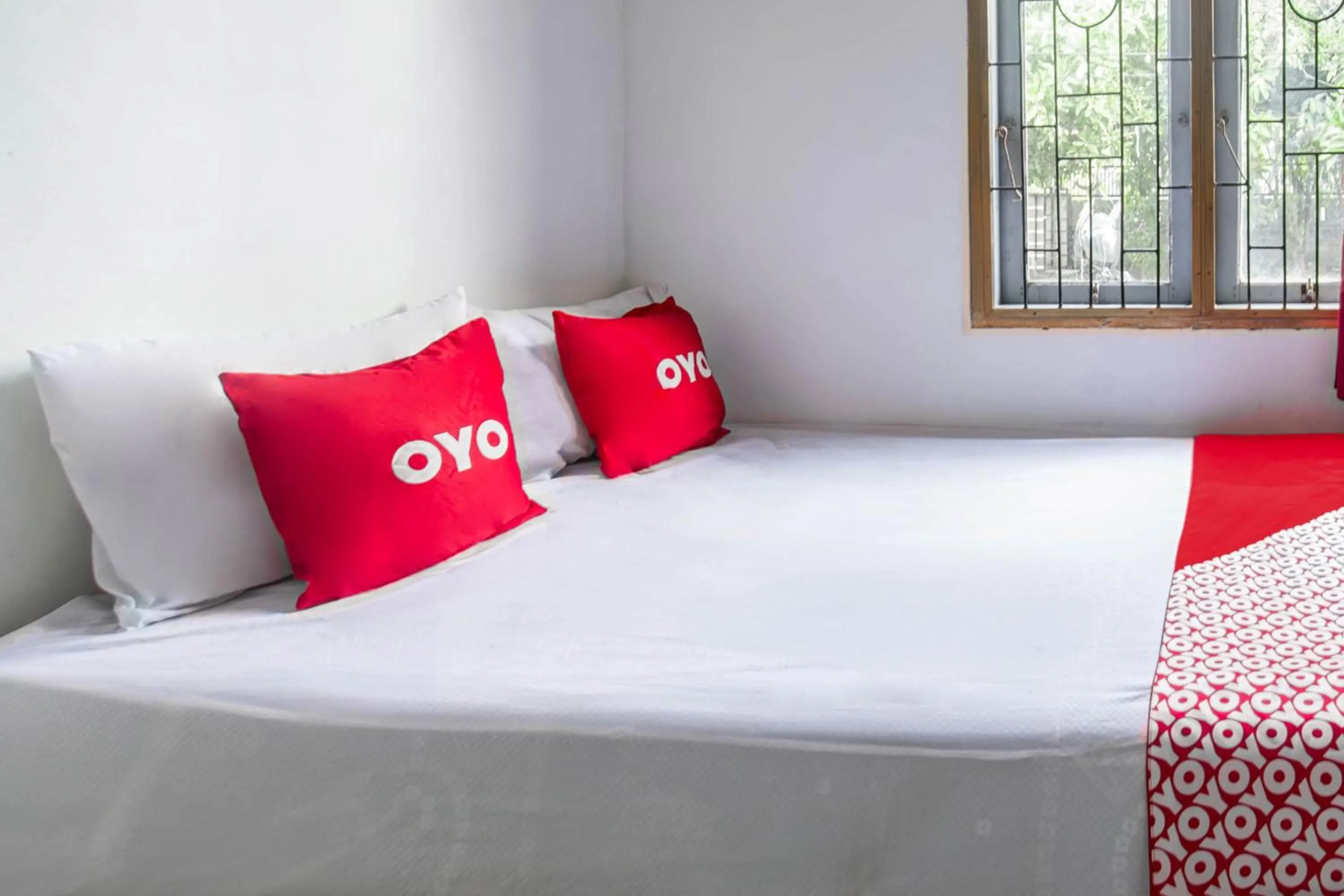 Bedroom, Bed in Hotel O Lestari Homestay