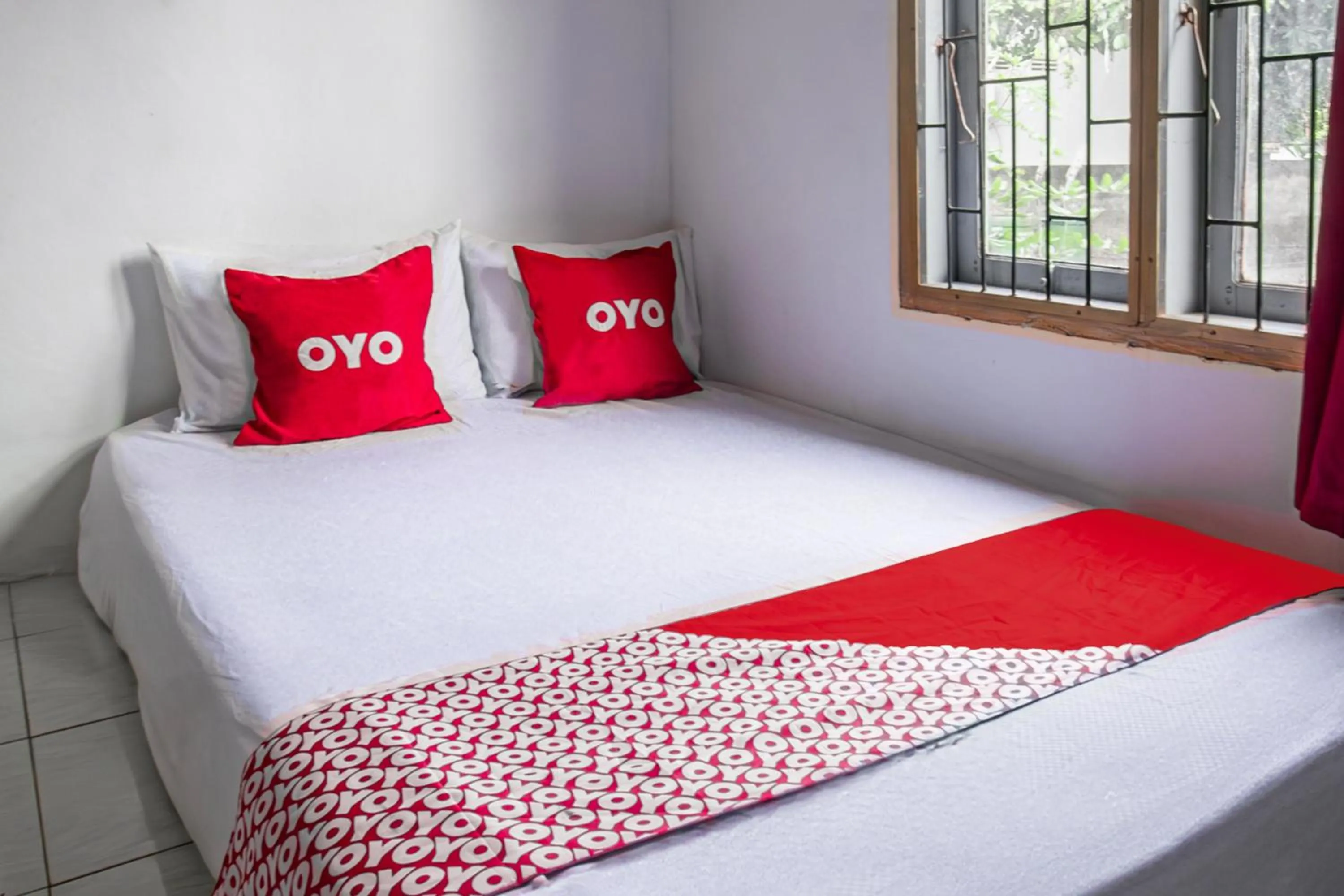 Bedroom, Bed in Hotel O Lestari Homestay