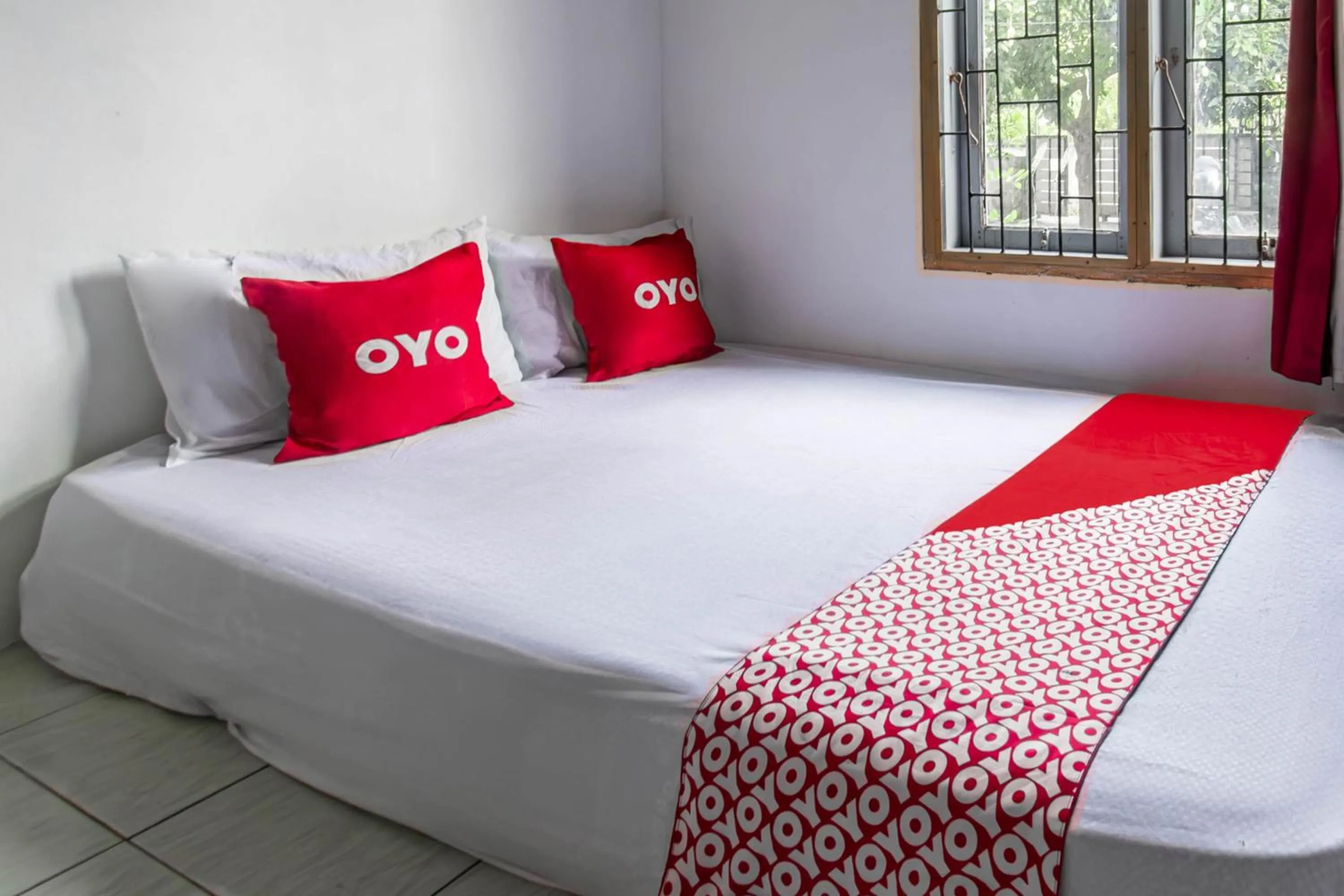 Bedroom, Bed in Hotel O Lestari Homestay