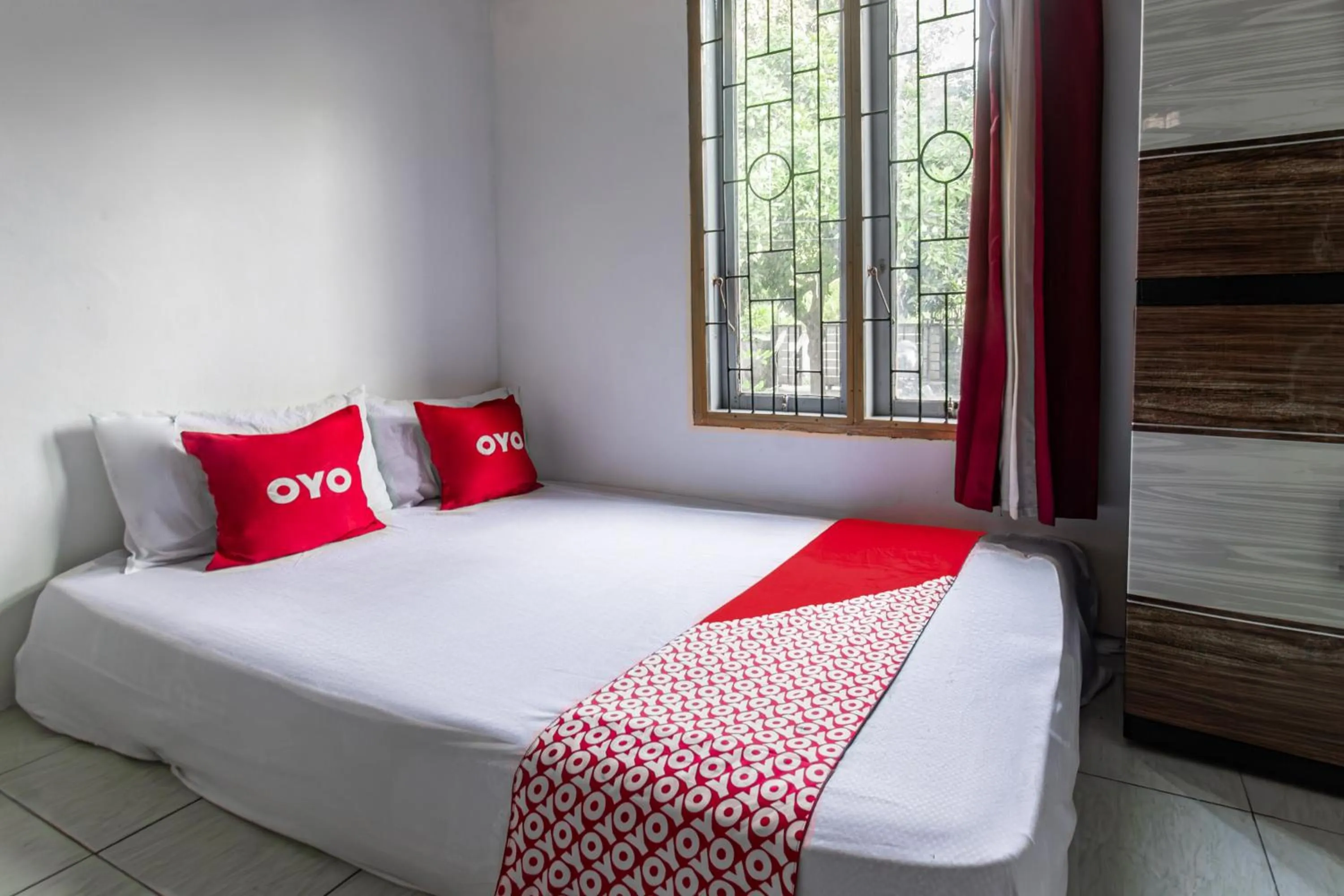 Bedroom, Bed in Hotel O Lestari Homestay