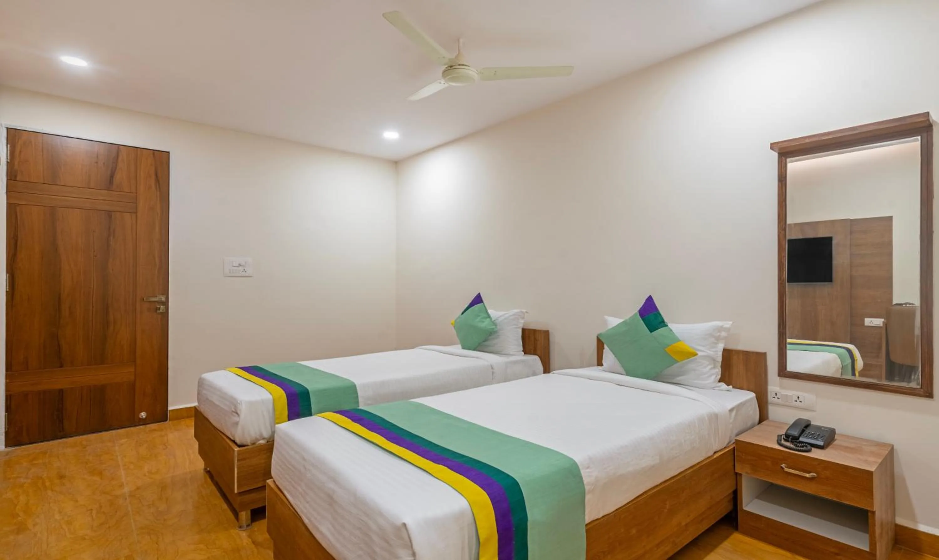 Bedroom, Bed in Treebo SY Inn, Gachibowli DLF