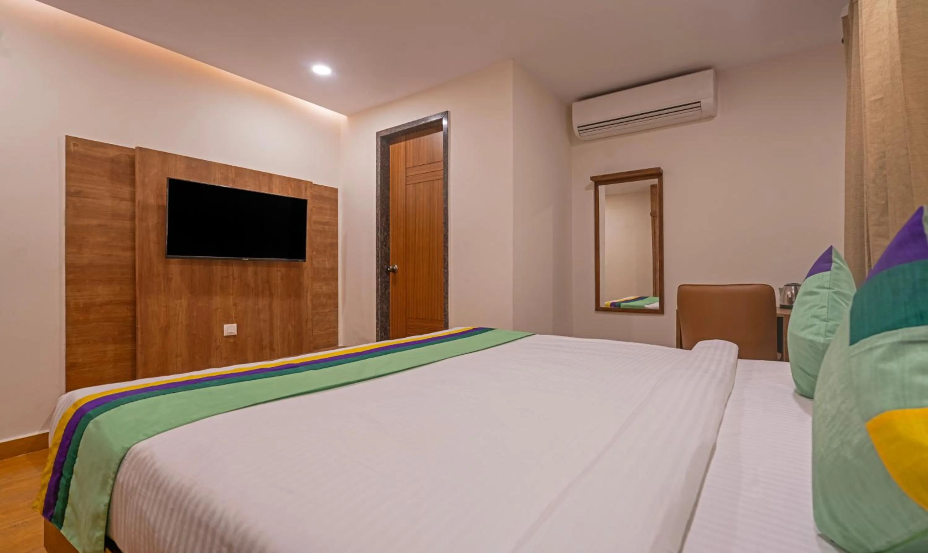 Bedroom, Bed in Treebo SY Inn, Gachibowli DLF