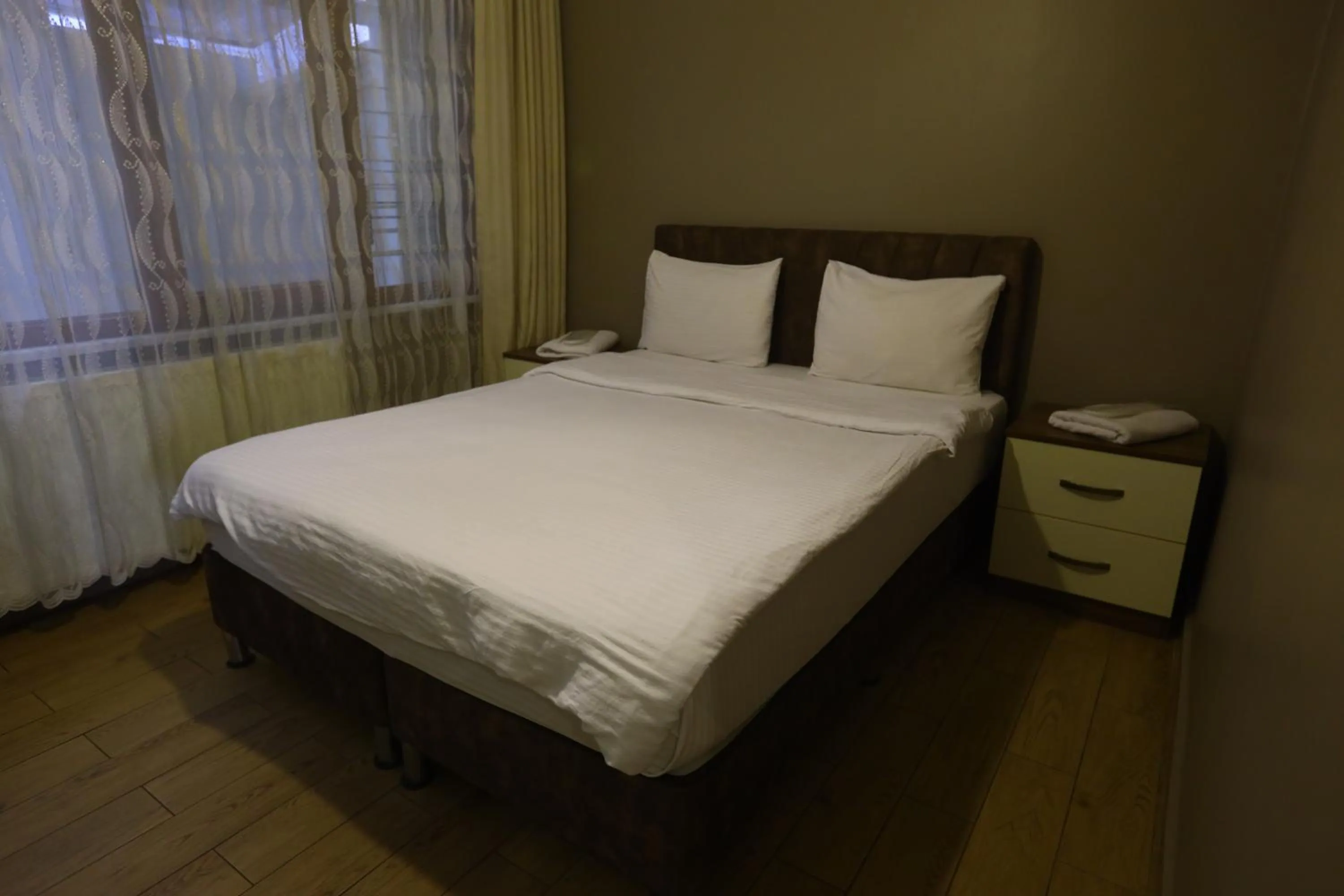 Bedroom, Bed in Zendy Suite Hotel