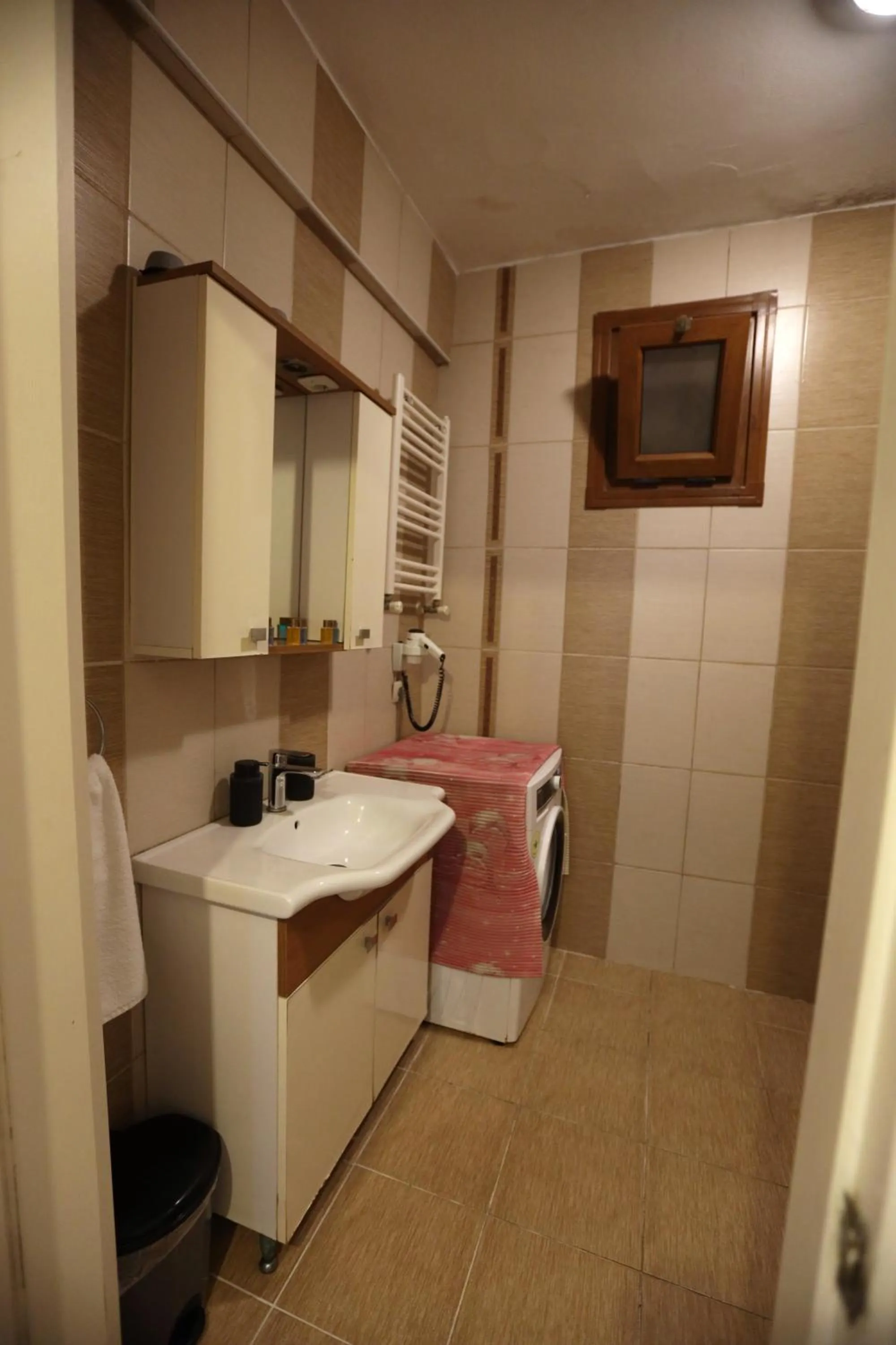 Bathroom in Zendy Suite Hotel