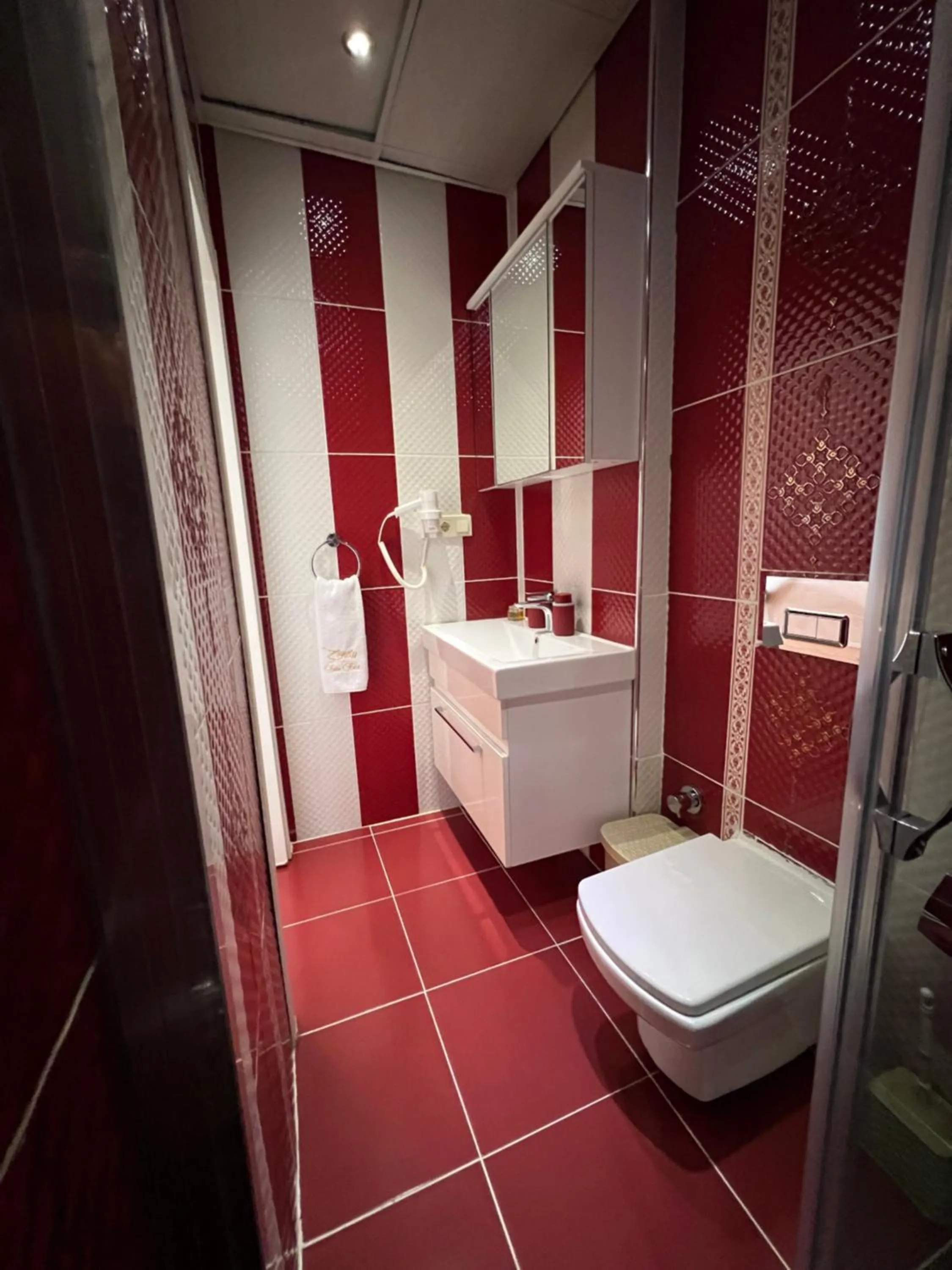 Bathroom in Zendy Suite Hotel