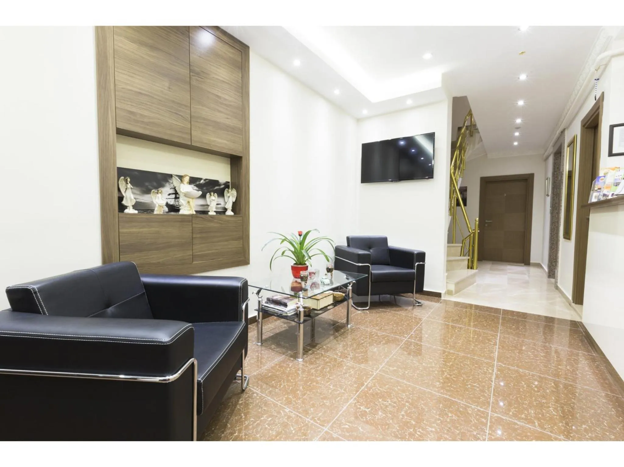 Lobby or reception in Zendy Suite Hotel
