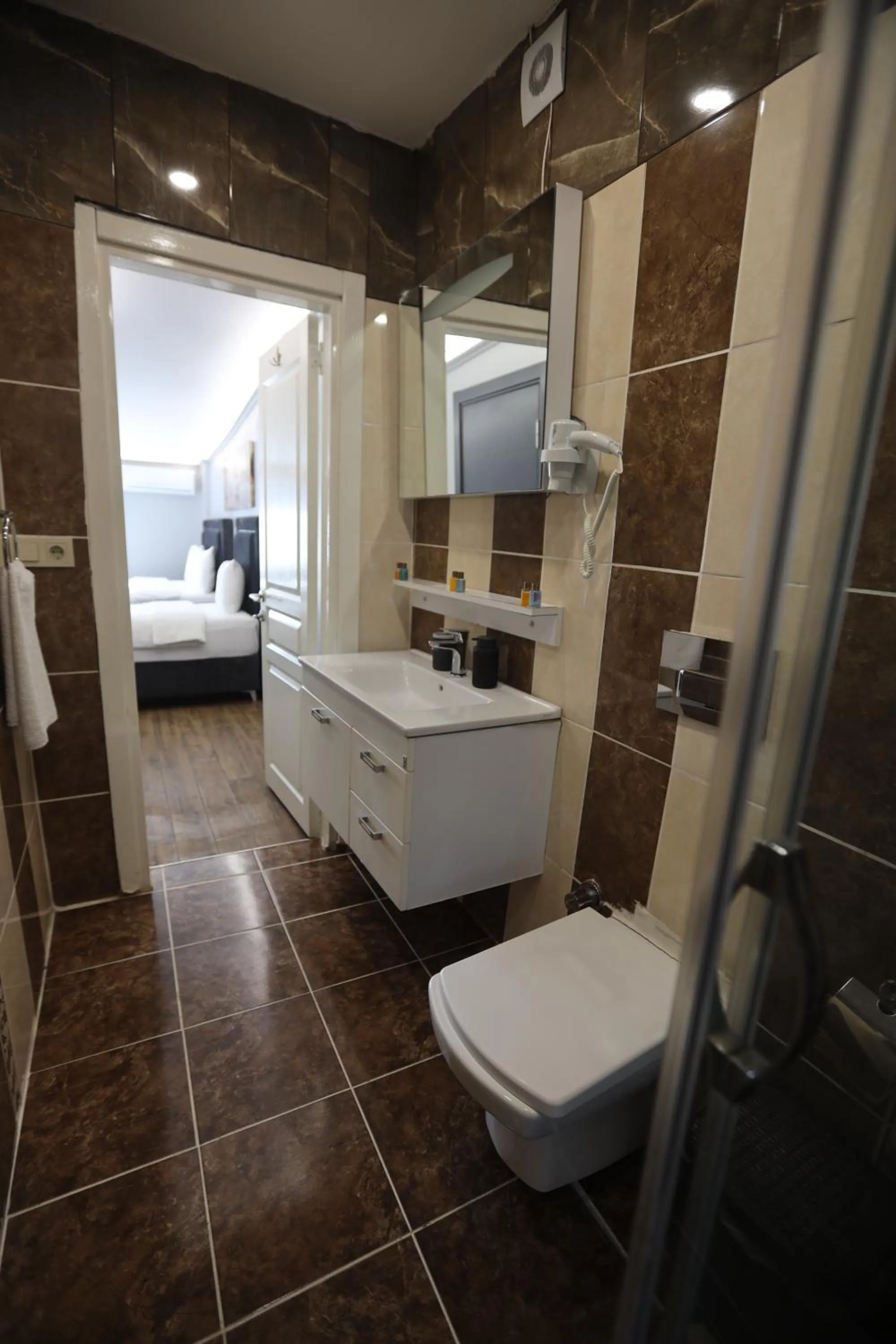 Bathroom in Zendy Suite Hotel