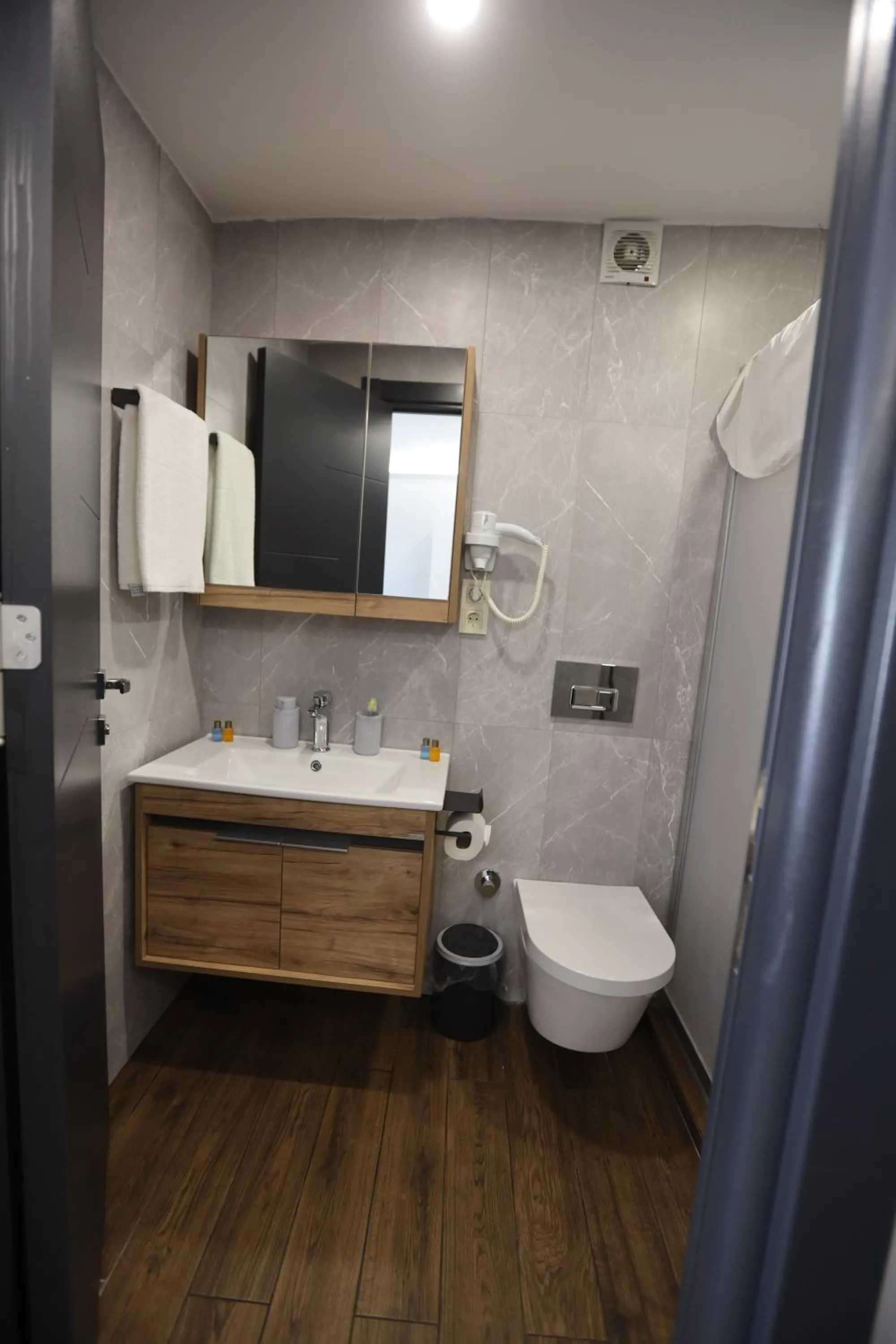 Bathroom in Zendy Suite Hotel