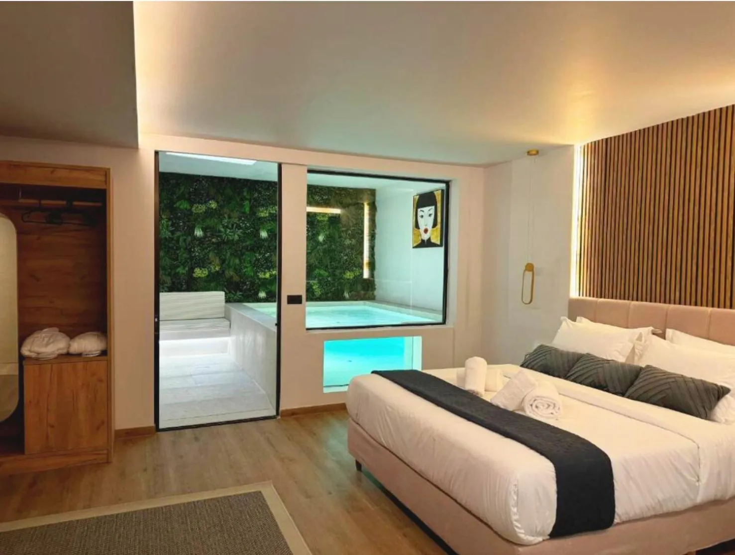 Bed in CITYLUXE Suites & Rooms